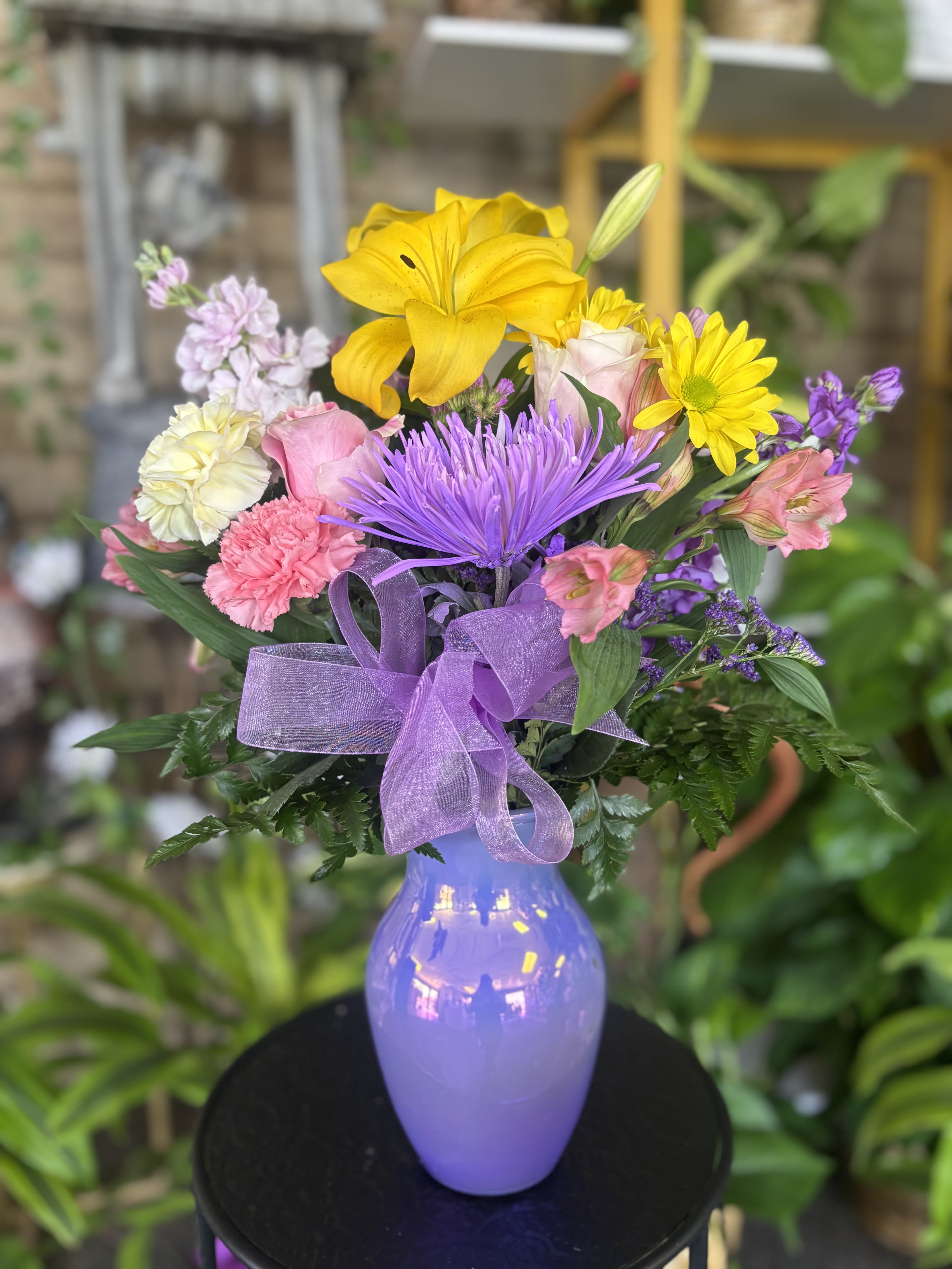 Here , There &amp; Everywhere  - Fresh flowers in purple vase 