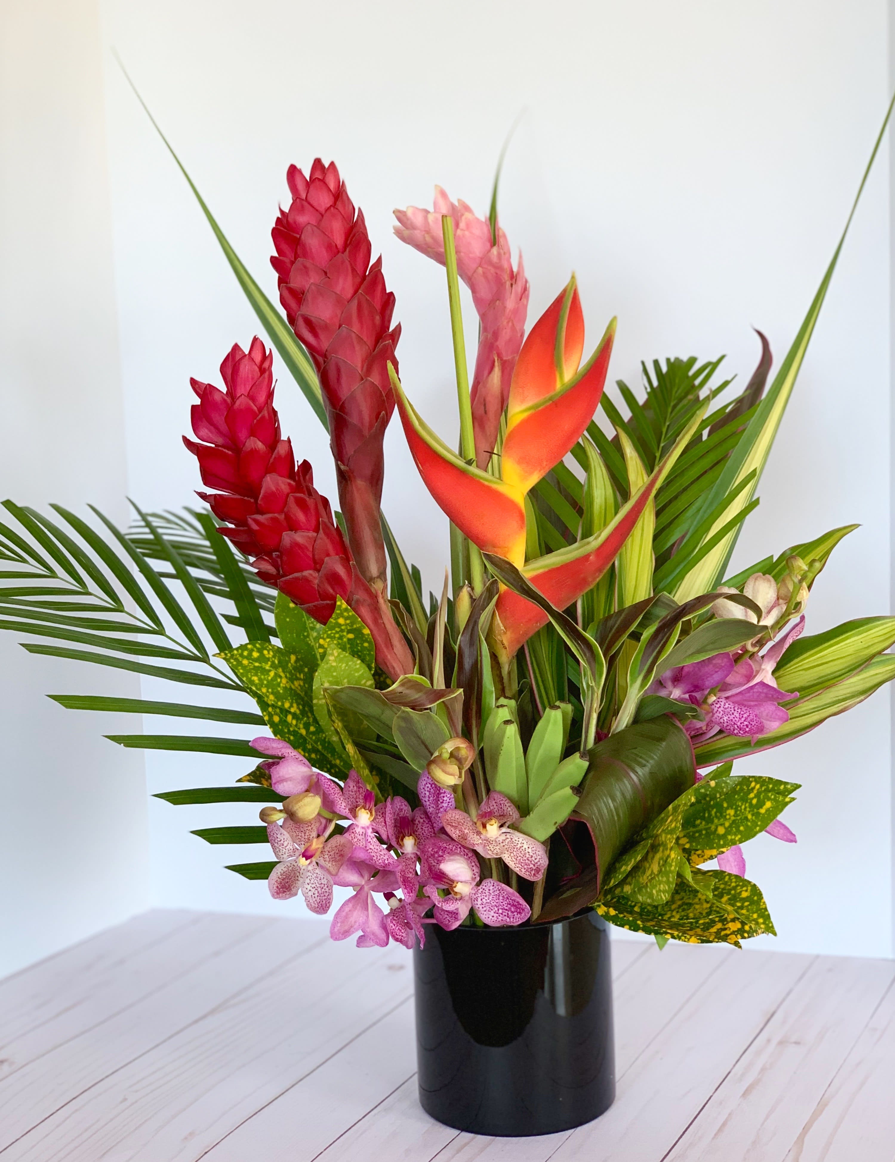 Dreaming of Kaui - Tropical flowers come together in this exciting bouquet that will having you dreaming of the tropics!
