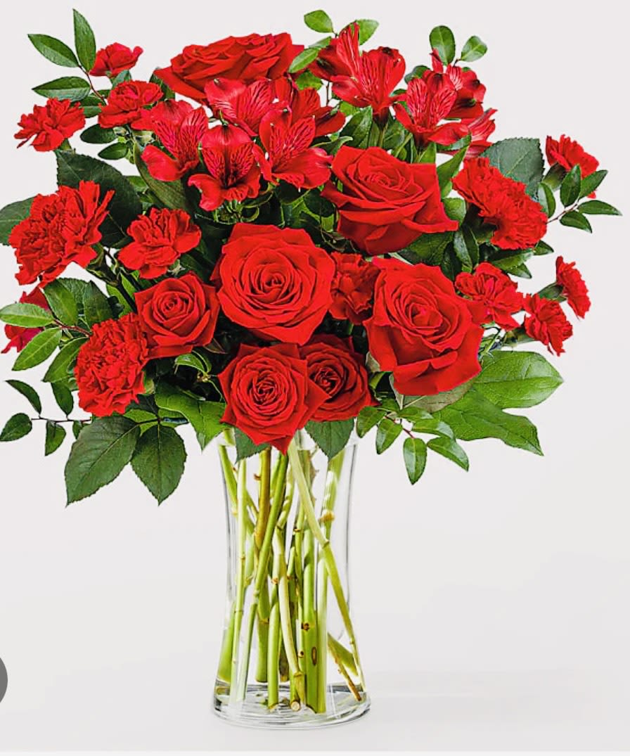 Brillant Ruby Bouquet  - A Vibrant selection of red florals are the way to go when expresing romance, admiration, or simply looking for a show - stopping present. 
