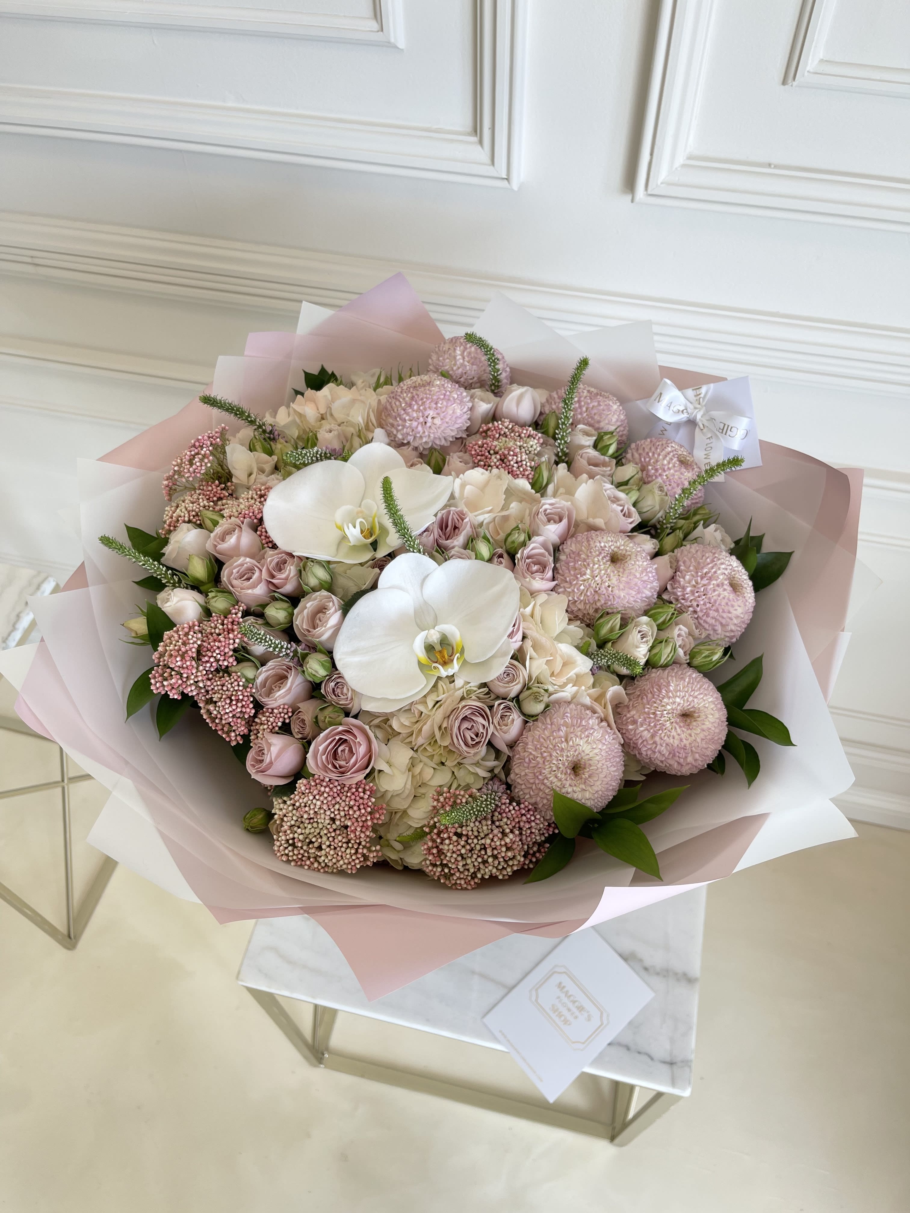 MFS Faith Bouquet  - Signature Hand-tied Bouquet  Roses  Phalaenopsis Orchids Hydrangeas   *This bouquet does not include a glass vase #260