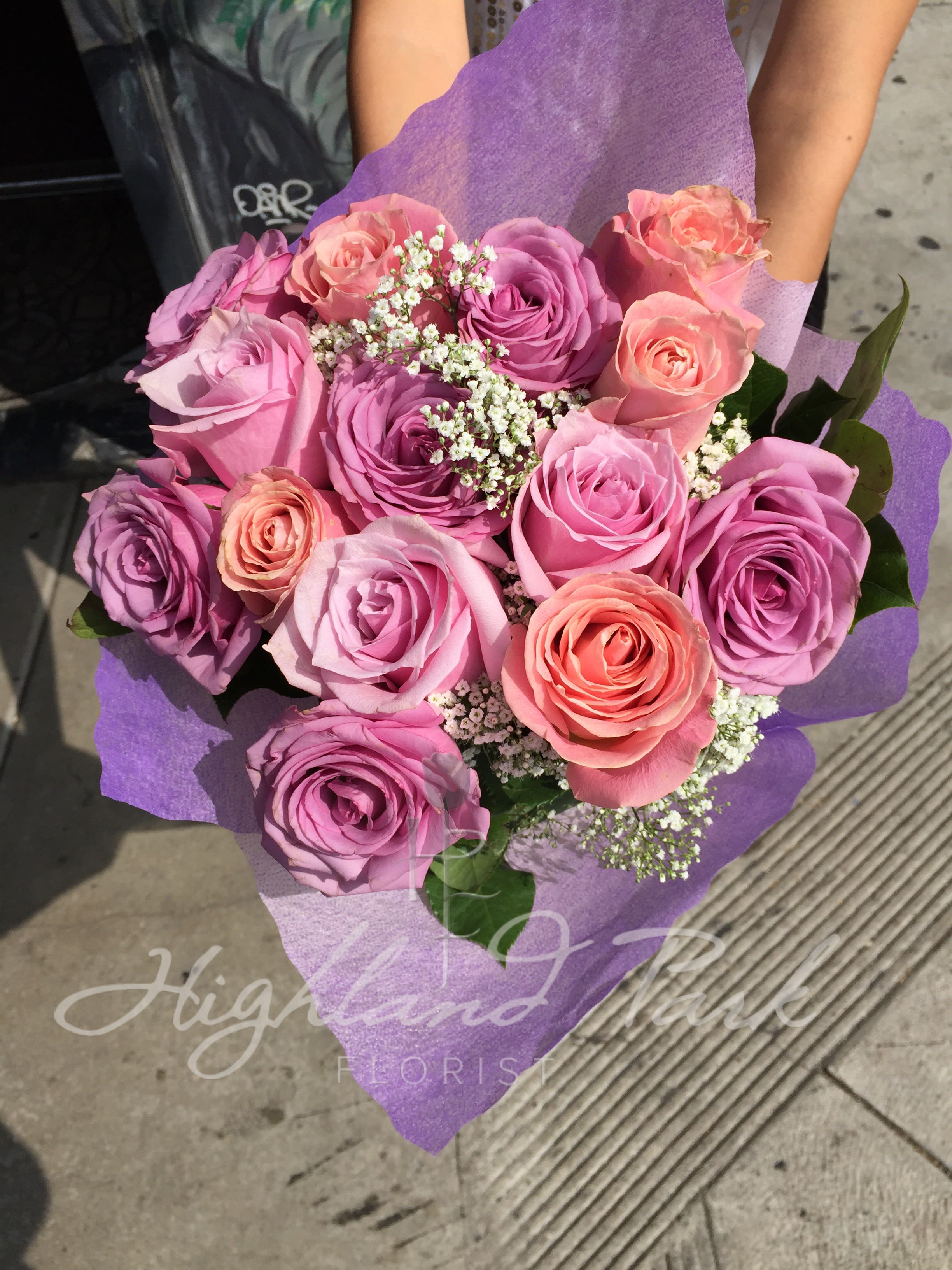 Pink &amp; Lavender Bouquet   - Light pink and lavender roses with baby's breath and greens arranged into a hand-tied bouquet.(no vase) 