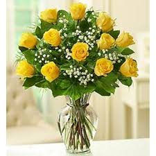 Dozen Yellow Roses &amp; Baby's Breath - A dozen roses is a timeless gift of love, and the time is always right to give and receive this enchanting gift. Birthday, anniversary or just because.   Yellow roses can represent friendship, joy and caring. A bouquet of these sun-filled blossoms conveys warmth, gladness and affection.