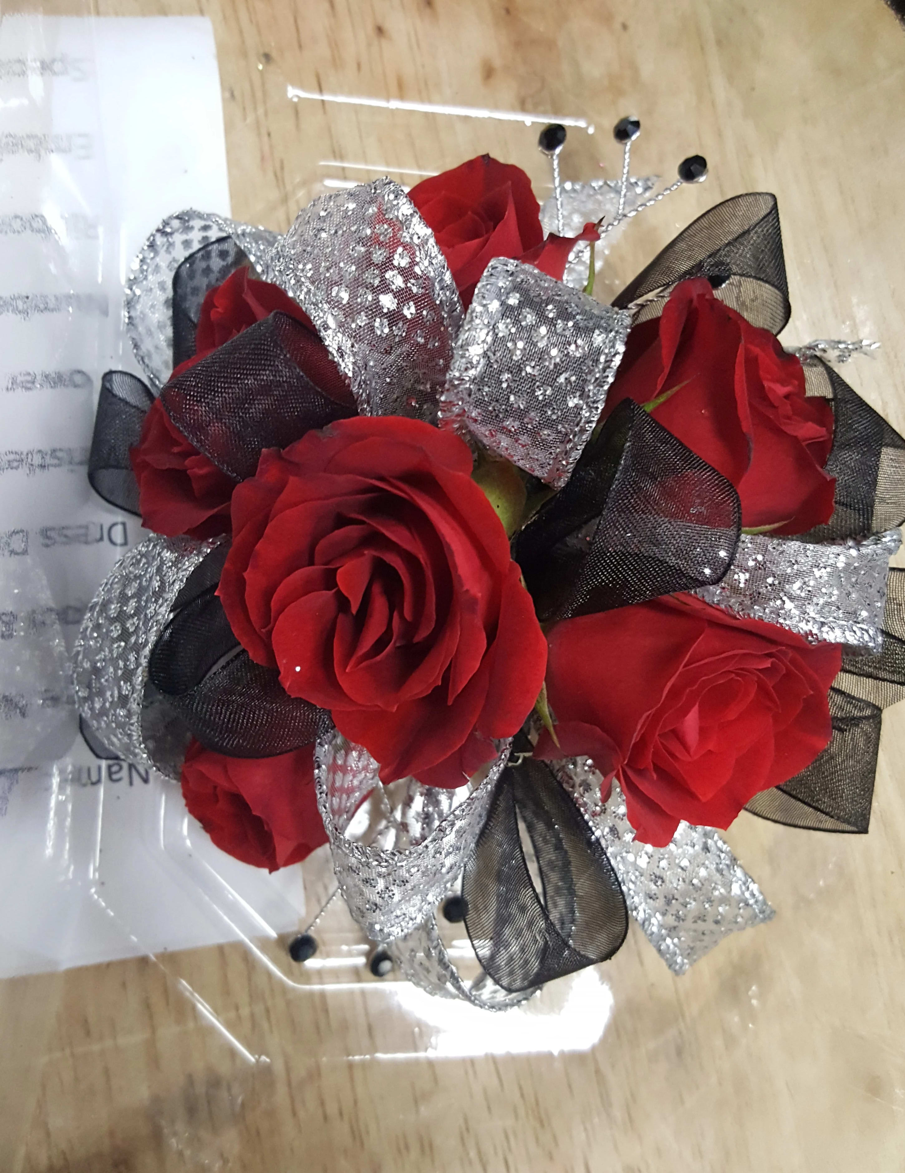 Scarlet &amp; Black Wrist Corsage  - Red sweetheart rose with black and silver accents. Must order at least 48 hours before event. 
