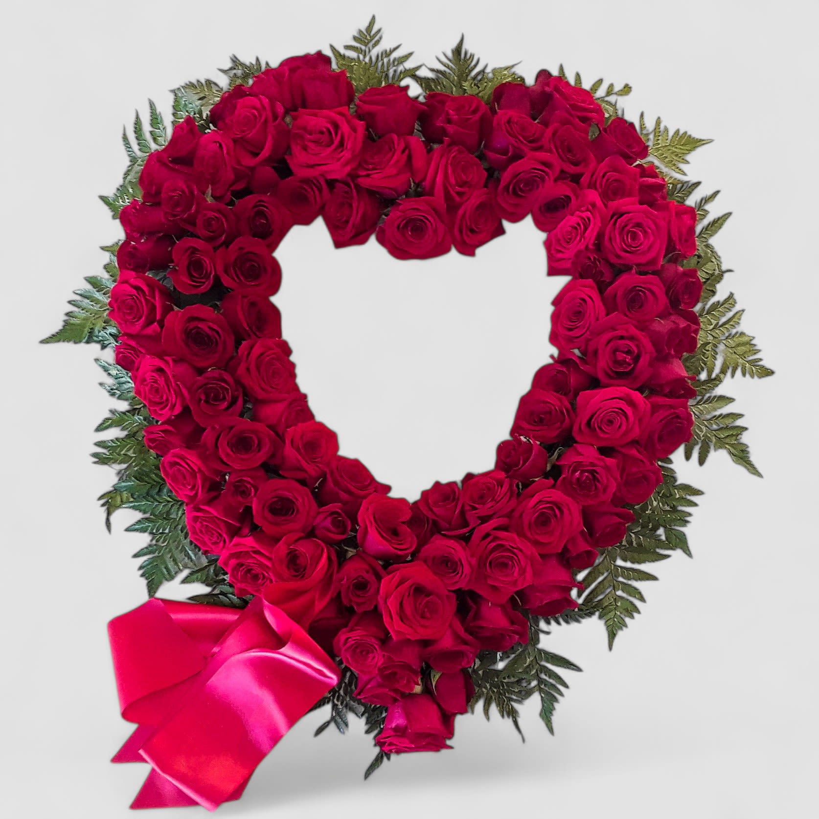 Red Rose Sympathy Heart - Please call first for availability. Please allow 48 hours notice. Send this beautiful red rose sympathy heart today to help them celebrate a life well lived. Loving and grand.