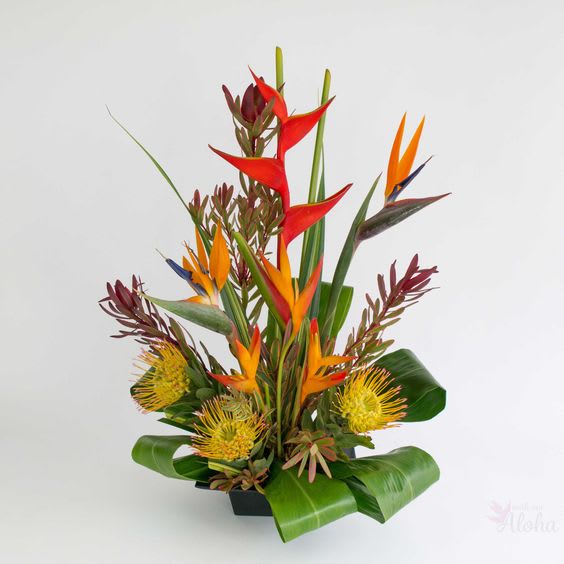 Huatulco Breezes  - This arrangement will bring you back to the Pacific coast of Mexico with this arrangement. 