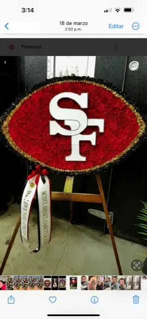 49ers Funeral Stand - red carnations on a wooden base and wooden letters