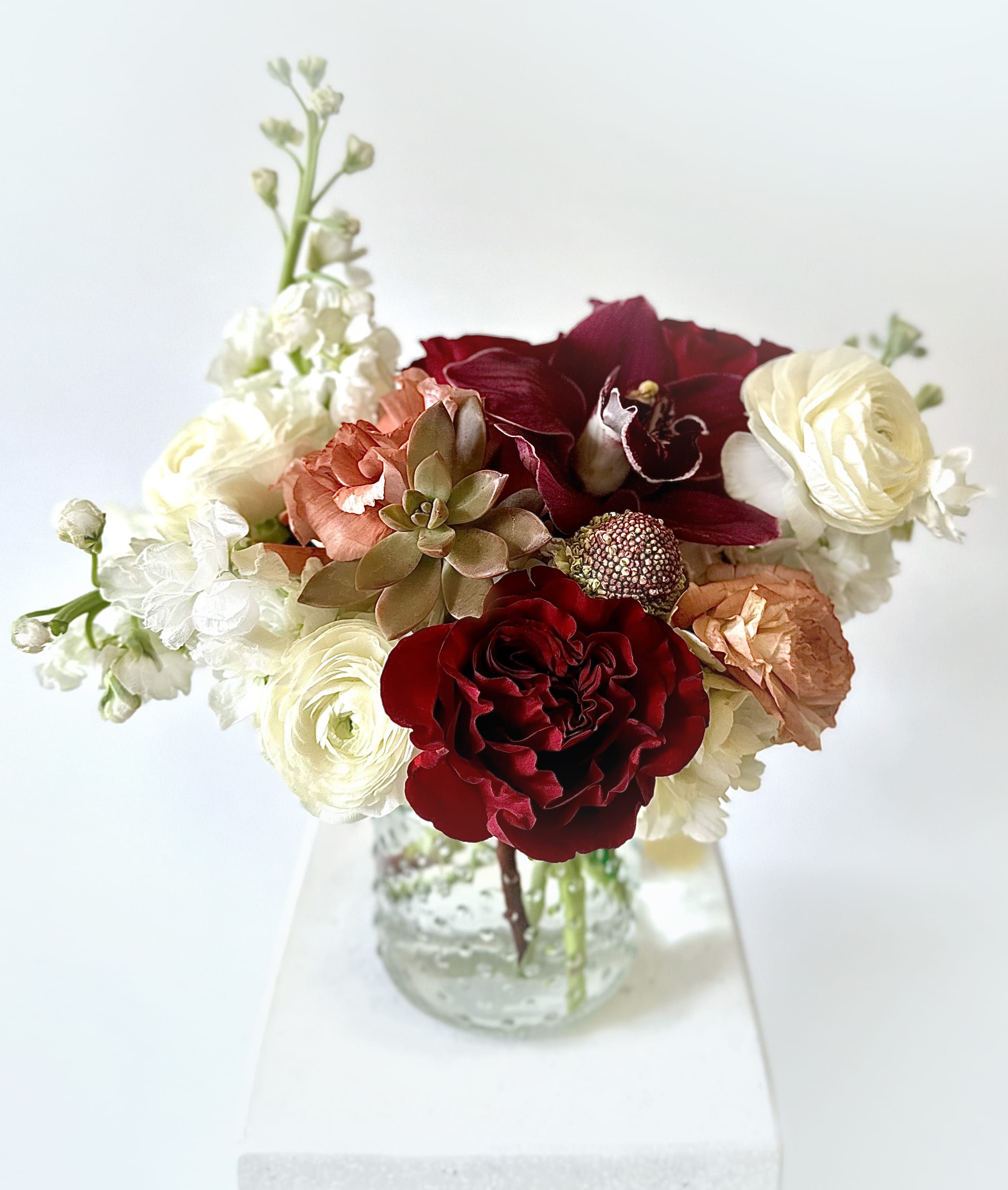 Velvet Cake  - Do you have a sweet tooth? Our Velvet Cake recipe uses Hydrangea, Stock, Ranunculus, Lisianthus, Roses, a Cymbidium Orchid, a Succulent, and Scabiosa.