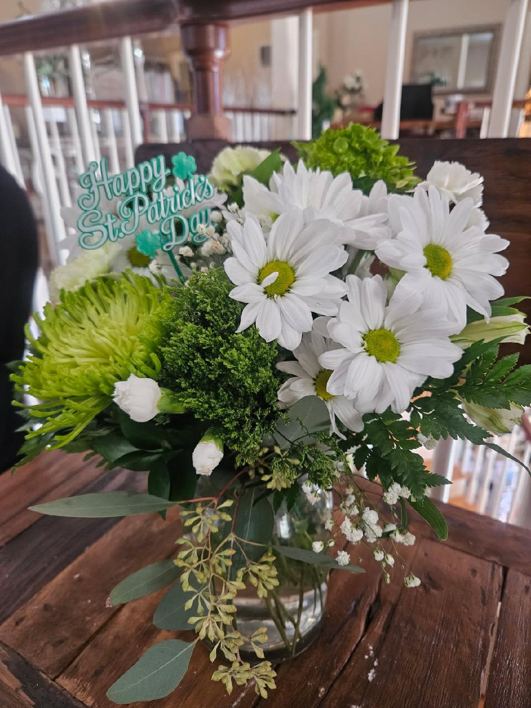  "Irish" you were here bouquet - Green hydrangea, white daisys, green trachilium, white alstromeria, green spider mums, white mini carnations and seeded eucalyptus designed in a milk jug vase.