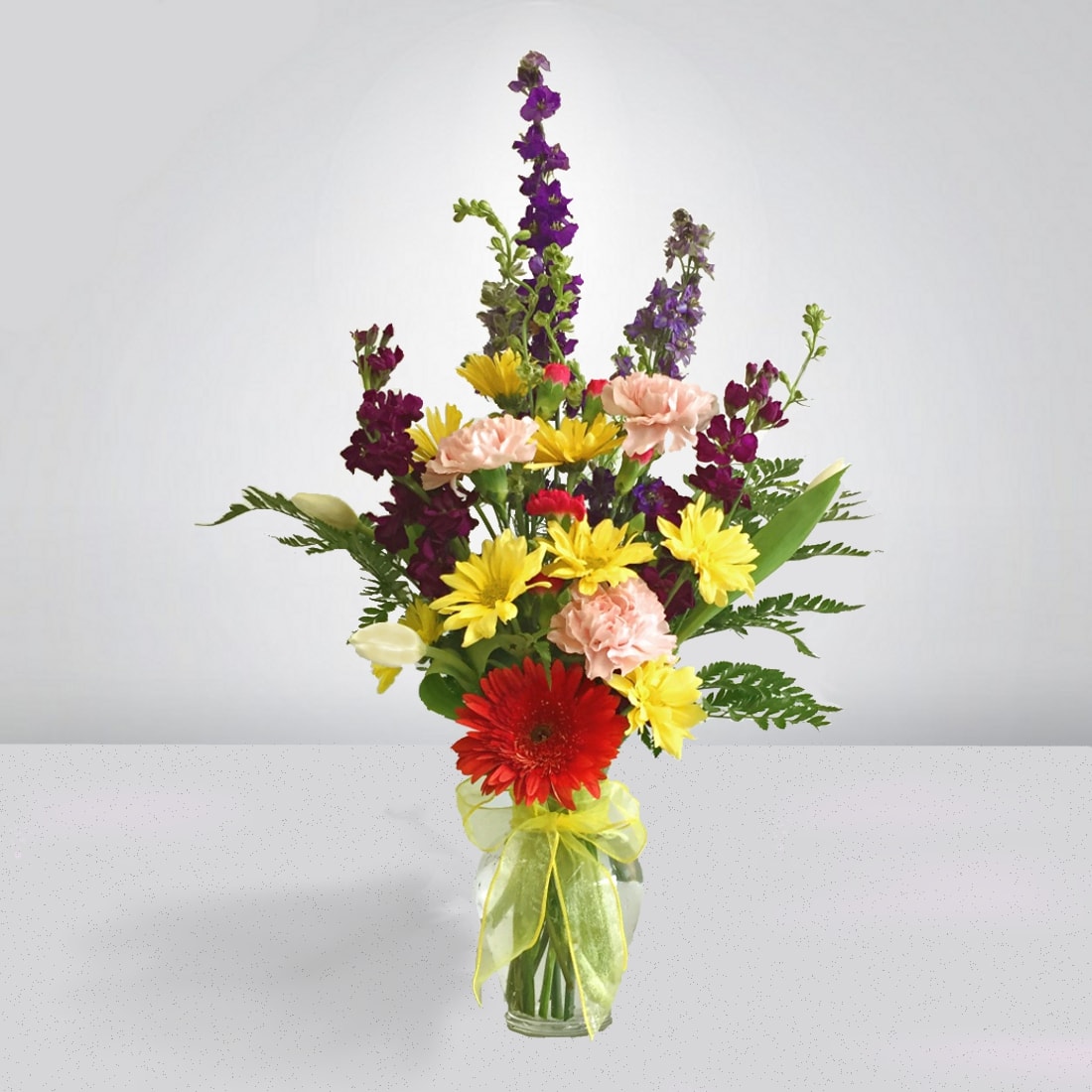 Thinking Of You - Let a special person or family know just how much you appreciate them and that they are in your thoughts. Thinking Of You is the perfect arrangement to send during trying times in one's life. Approximate Dimensions: 12"W x 24"H