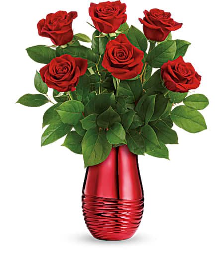 Rouge Romance - The epitome of romance, this classic red rose bouquet looks oh-so-luxurious in a magnificent rouge ceramic vase.