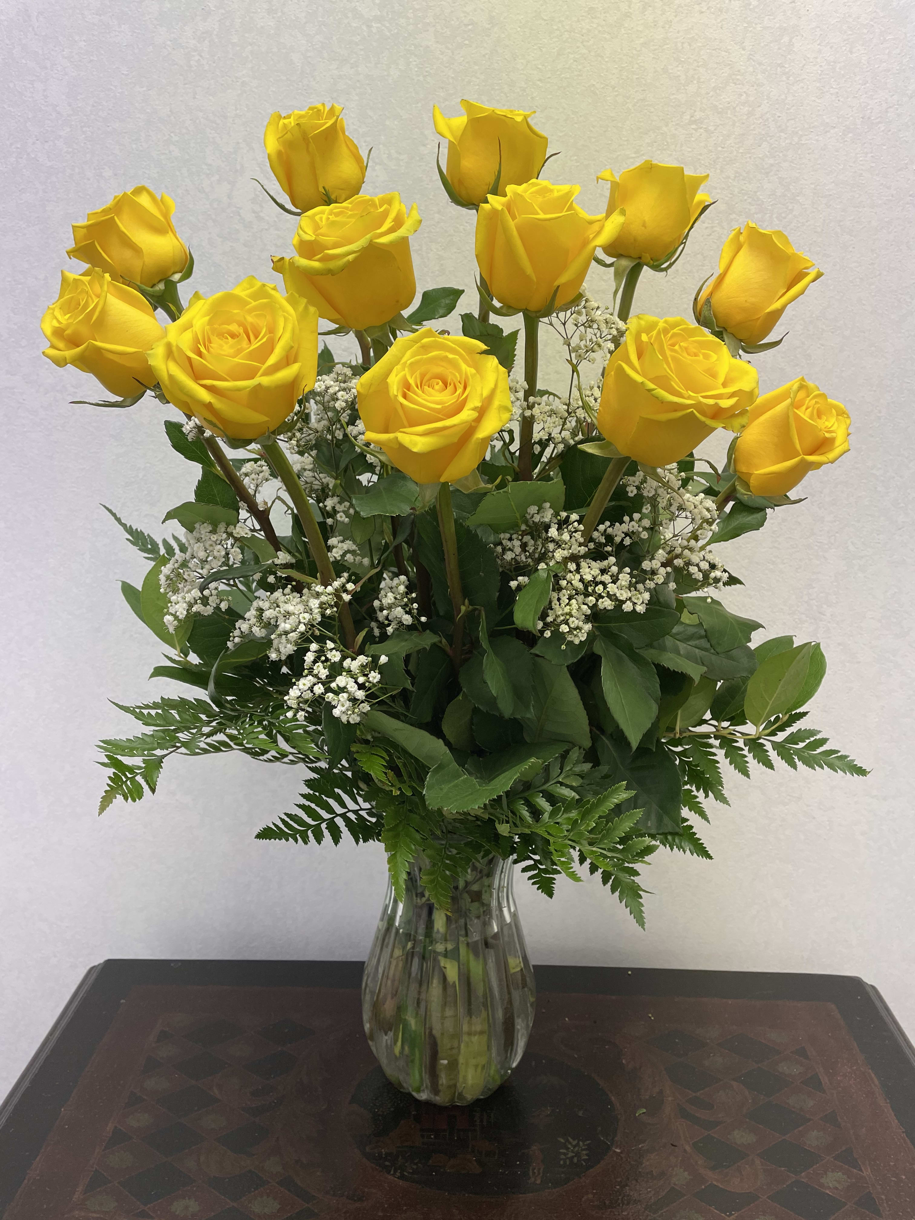 You're My Sunshine Yellow Rose Bouquet  - Sunny yellow roses will brighten anyone's day. This lively bouquet is arranged in a clear glass vase with mixed greens and baby's breath.  DYV