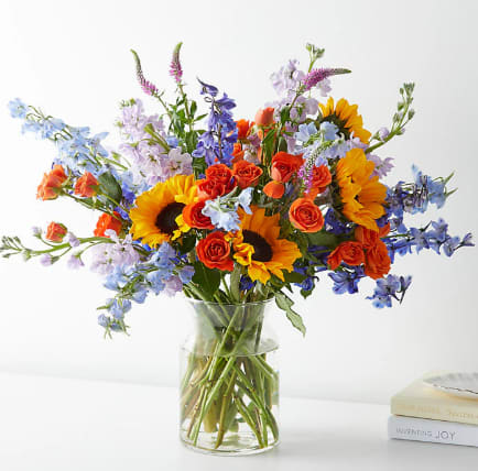 MEADOW MORNINGS - Feel the love from every direction with these beautiful sunflowers, roses, and delphiniums