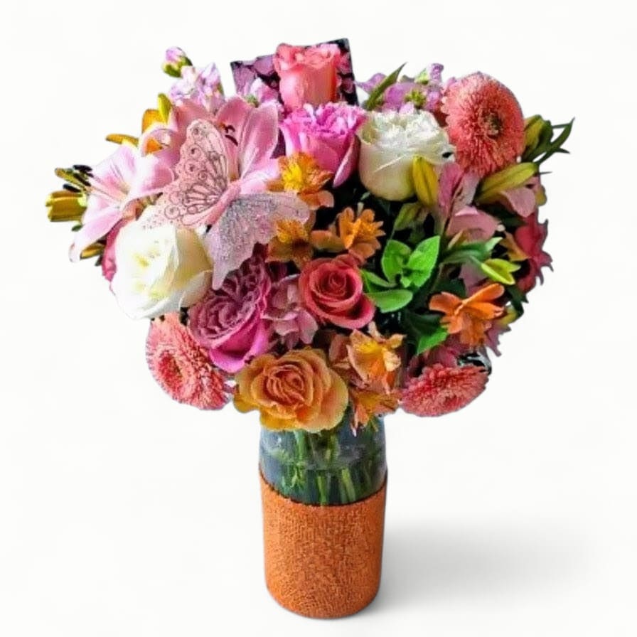 Bella Happy Birthday Beautiful Bouquet Designer's Choice - Roses orchids and more. Perfect for every occasion. Send this beautiful bouquet today to show them how much you care with it's beautiful mixed blossoms of that day arranged in a modern glass vase wrapped in beautiful citrus jute ribbon. All flower arrangements that leave my flower studio are beautiful works of art, made special and unique each time. Please visit my beautiful gallery to see my most recent designs that I have created for my online customers. Send them a special bouquet to make them smile today.