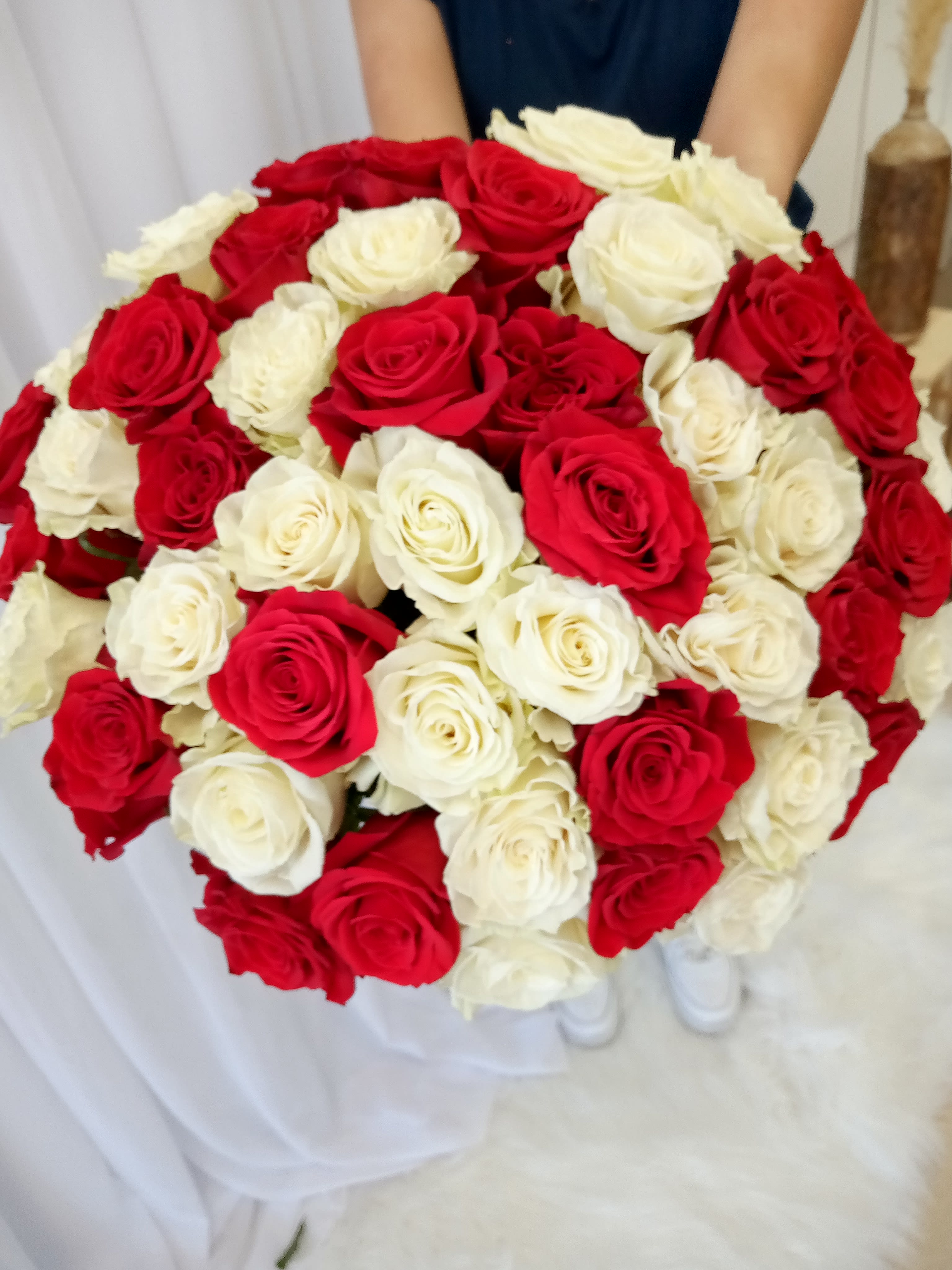      peace and love bouquet     24 ---36 or 48  red and white roses combination - best way to show love and respect to her,,, beautiful arrangement with the best and fresh flowers