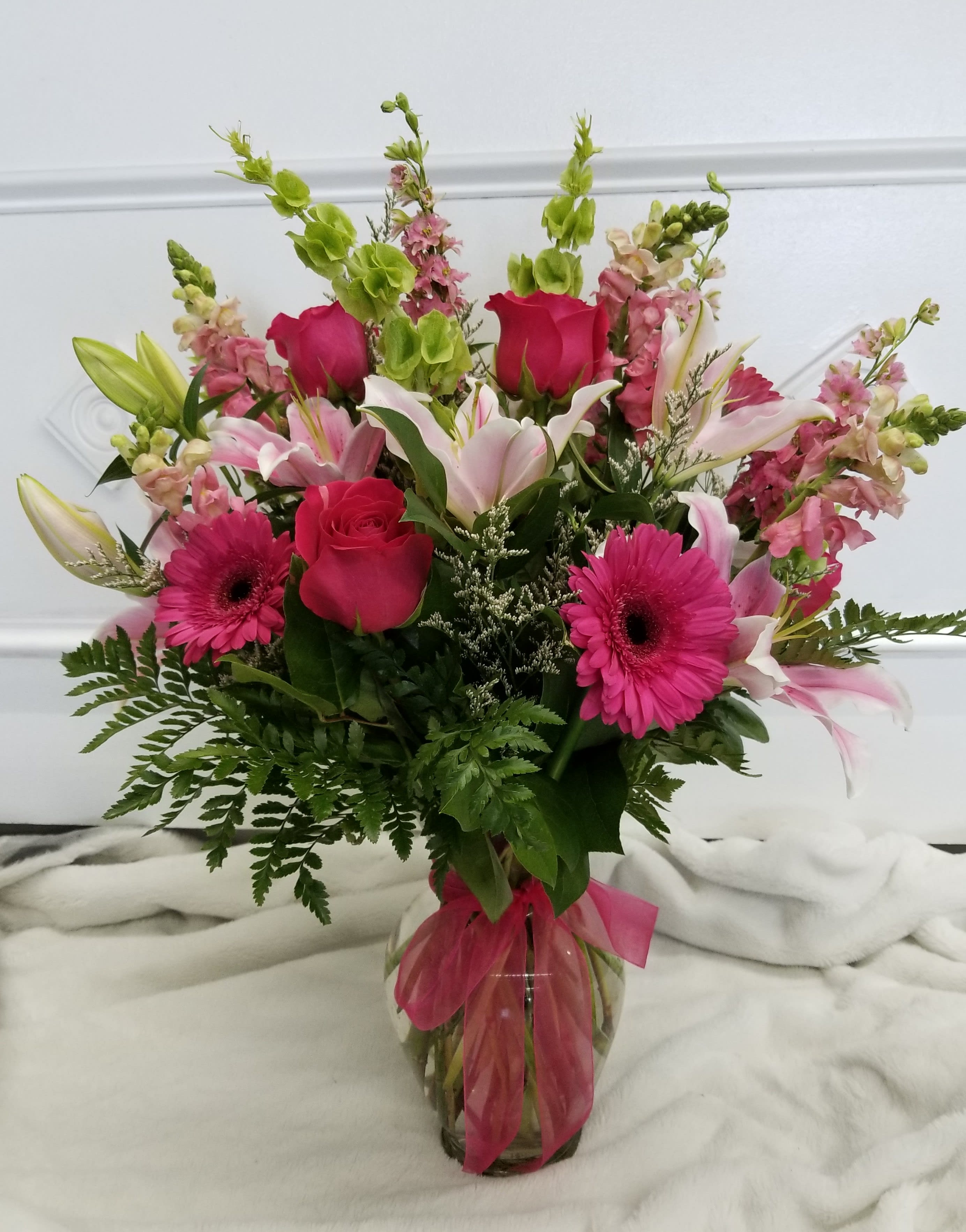 Perfectly Pink  - Beautiful mixed arrangement in different shades of pinks with a touch of green.