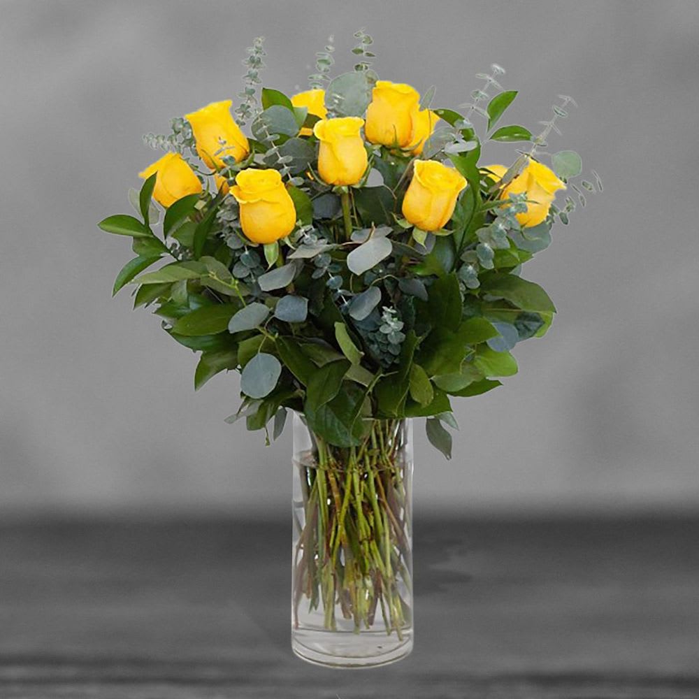 Yellow Rose Bouquet - Yellow Rose Bouquet Nothing brightens someone's day quite like the sunny shade of yellow. While vibrant yellow roses are a symbol of friendship, this bouquet makes a welcomed gift for any loved one.