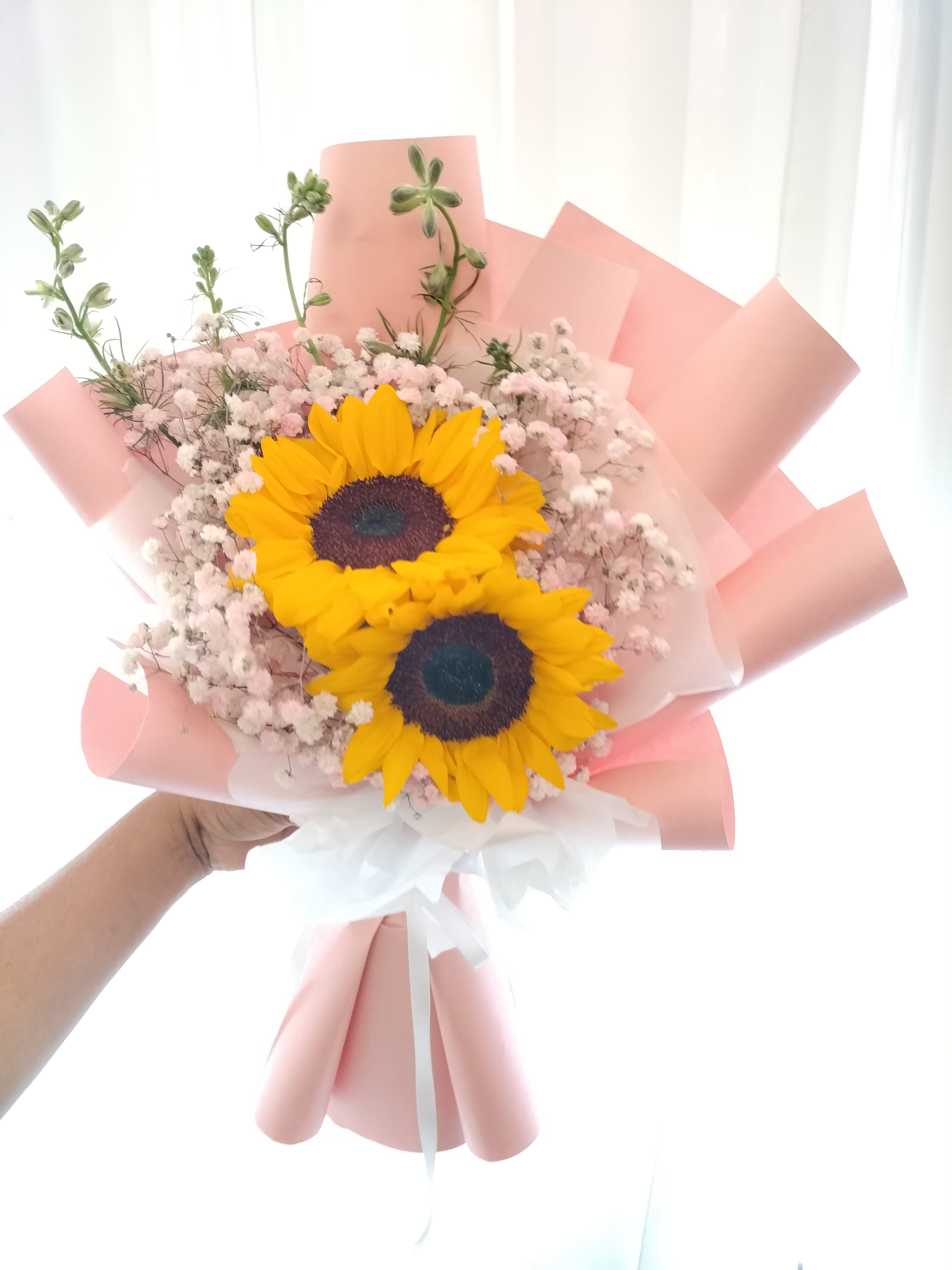 Pretty Sunflower Bouquet - 2 sunflower, baby breath, wrap pink paper.