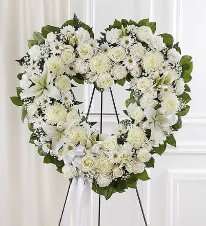 Heart Wreath Arrangement - Our Heart Wreath Arrangement comes in two sizes 22" and 24". The flowers and colors can be adjusted as you prefer. Please leave us a note with the colors your prefer. 