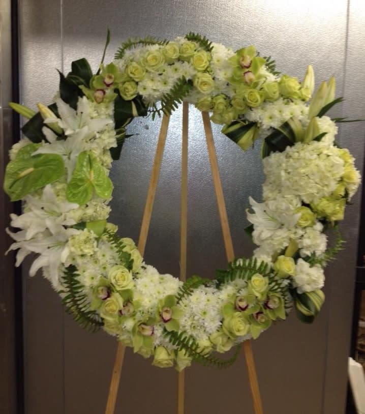 Green Orchid Wreath - An Elegant wreath with Green Orchids, Anthiriums, Lilies, and Roses. Dimensions are 27"
