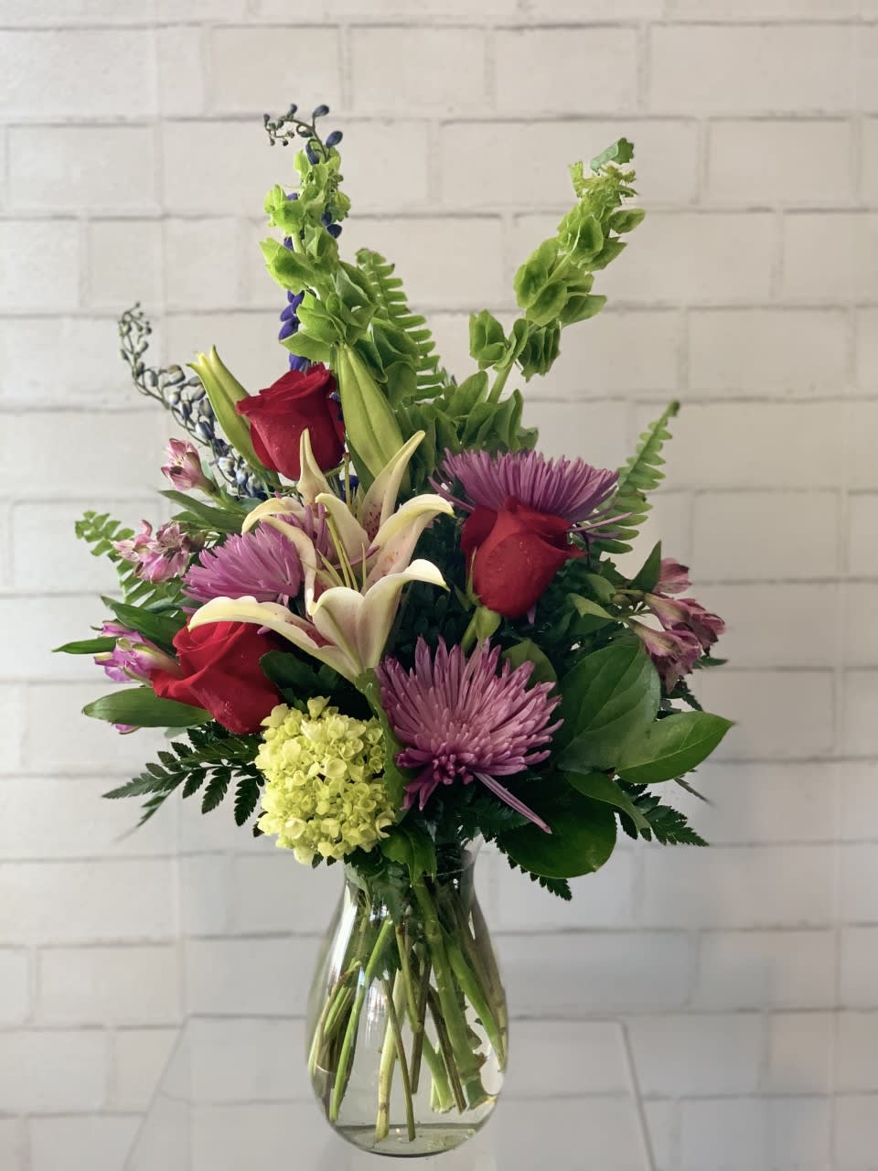 Summer Fling - A pretty bouquet with Lilies, roses, cremones, &amp; other summery flowers.
