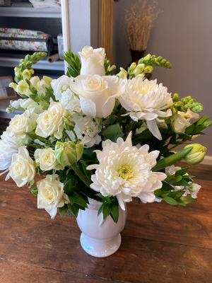 WHITE PARADISE -  GLAZED WHITE CERAMIC VASE IN A TULIP SHAPED WITH LARGE WHITE ROSES, SPRAY ROSES, WHITE SPIDER MUMS, SNAPDRAGONS AND TULIPS. WOULD MAKE ANYONE WANT TO BE IN PARADISE  