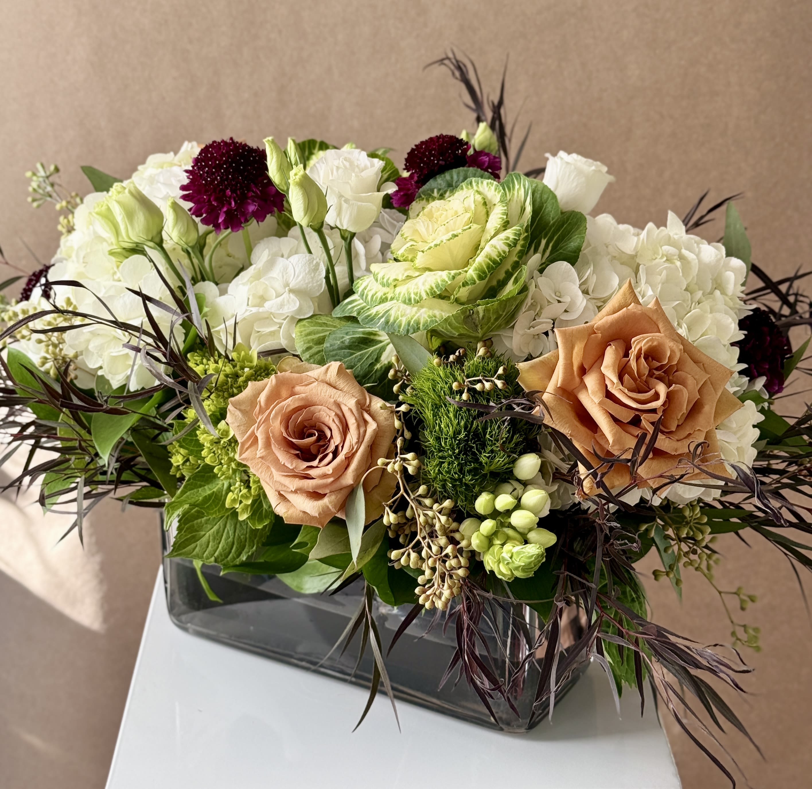 Charlie - Warm, cozy blooms in a glass vase.
