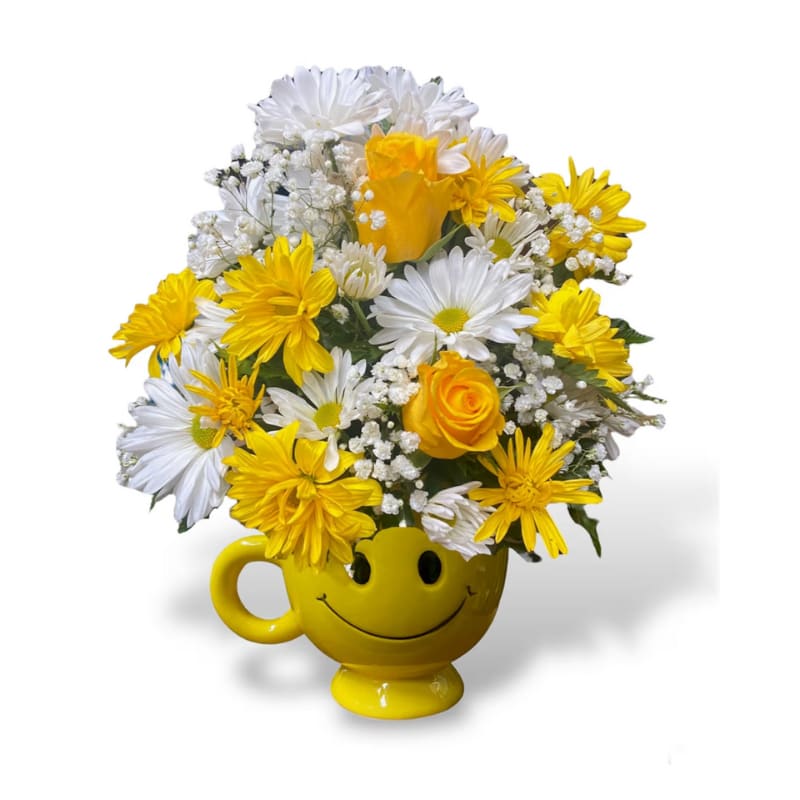Be happy  - When you're looking to make someone smile, this happy face mug of roses and daisies is tops. Sure to cheer up everyone from a beloved wife to a busy boss, these are also great flowers for kids.