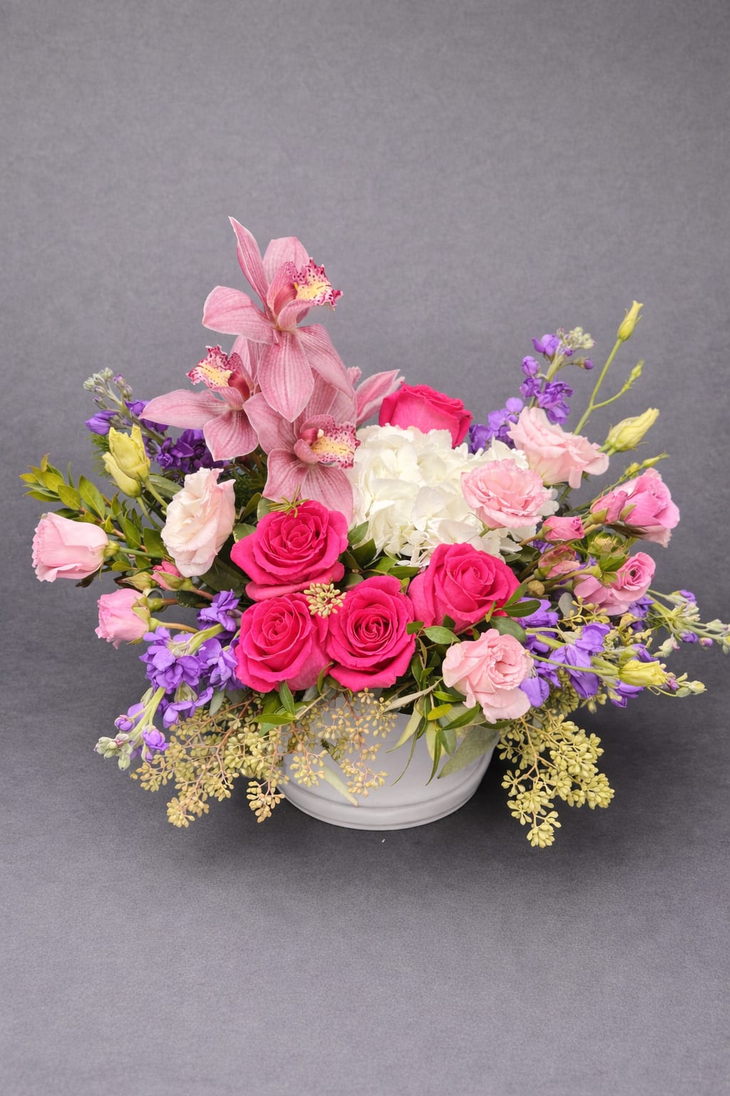 Love in Bloom - Blushing roses and graceful florals come together in a dreamy design that speaks the language of love.