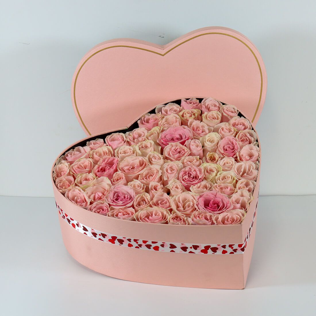Pink Roses in Heart Box  - Heart-shaped rose box, designed to impress the moment it arrives. Filled with pink roses this arrangement is hand-crafted, elegant, and gift-ready the perfect expression of love.    Some florals are seasonal, if particular flower will not be available due to season, we will substitute for similar flower, composition, color pallet and value of the arrangements as closely as possible. All effort to create a floral arrangement as close to the photo shown, the actual arrangement may vary slightly in its appearance from the photo shown. If you have any questions about your order, we welcome you to call us or email    Holiday Delivery:  Same-day delivery available. Deliveries are made throughout the day based on routing.  
