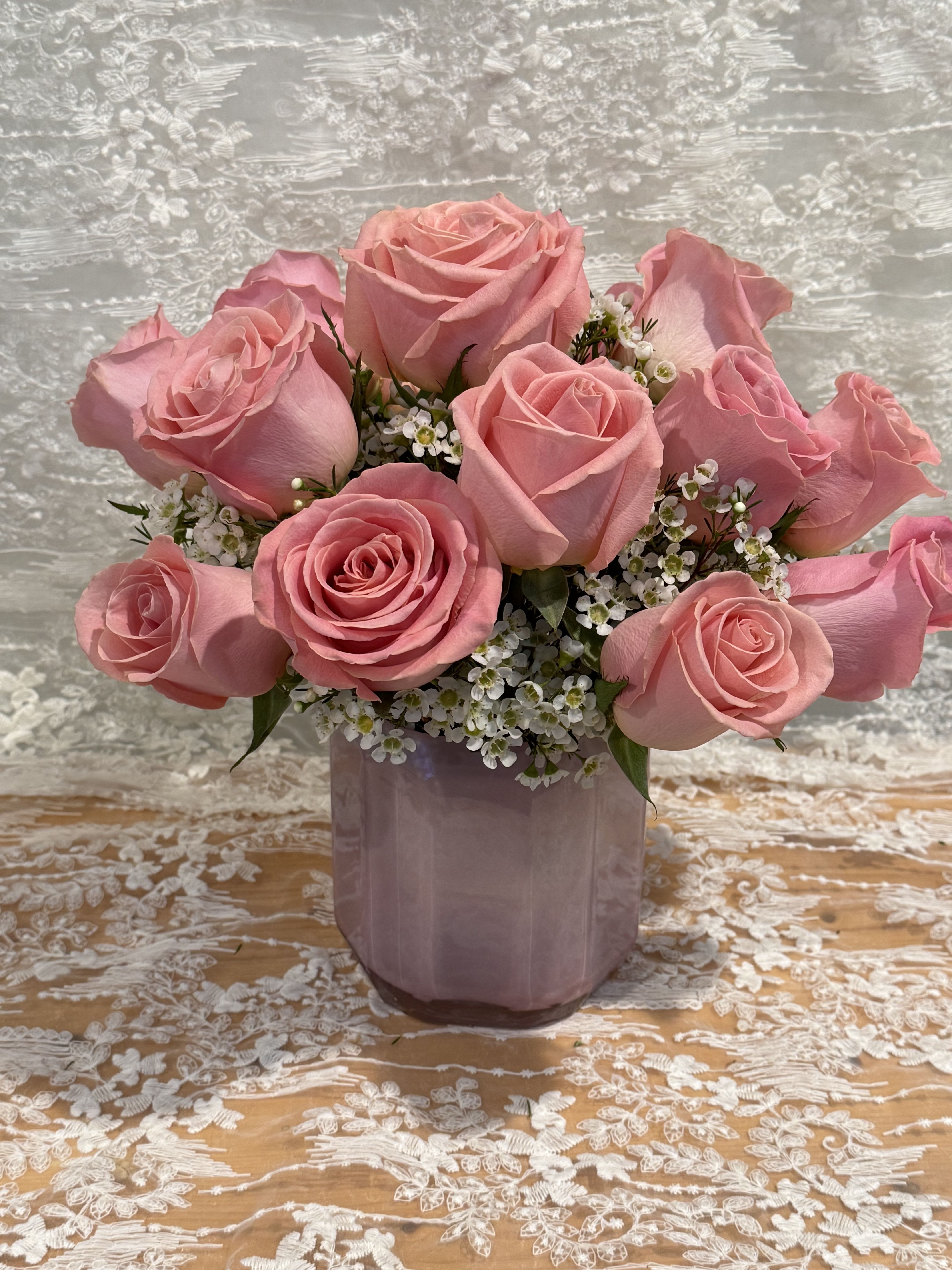 Graceful - Pink roses with wax flower in a jewel short vase
