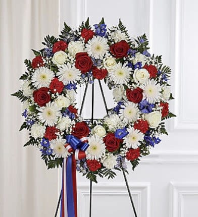 Round Wreath Arrangement - Our Round Wreath Arrangement comes in two sizes 22" and 24". The flowers and colors can be adjusted as you prefer. Please leave us a note with the colors your prefer.   