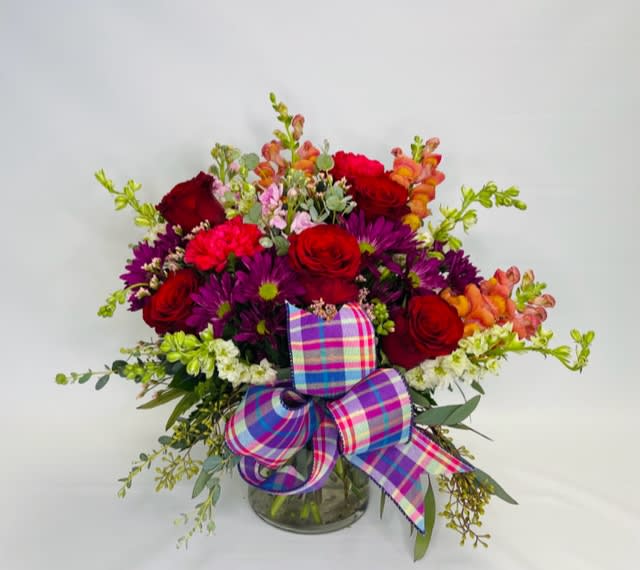 Passion - A low compact design filled with seasonal flowers in mixed lovely tones.