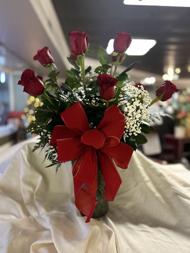 Infinity  - Inform that extraordinary person you will cherish them until the final bloom withers. With this distinctive setup, you will receive 11 red roses along with 1 artificial rose that will endure until eternity.