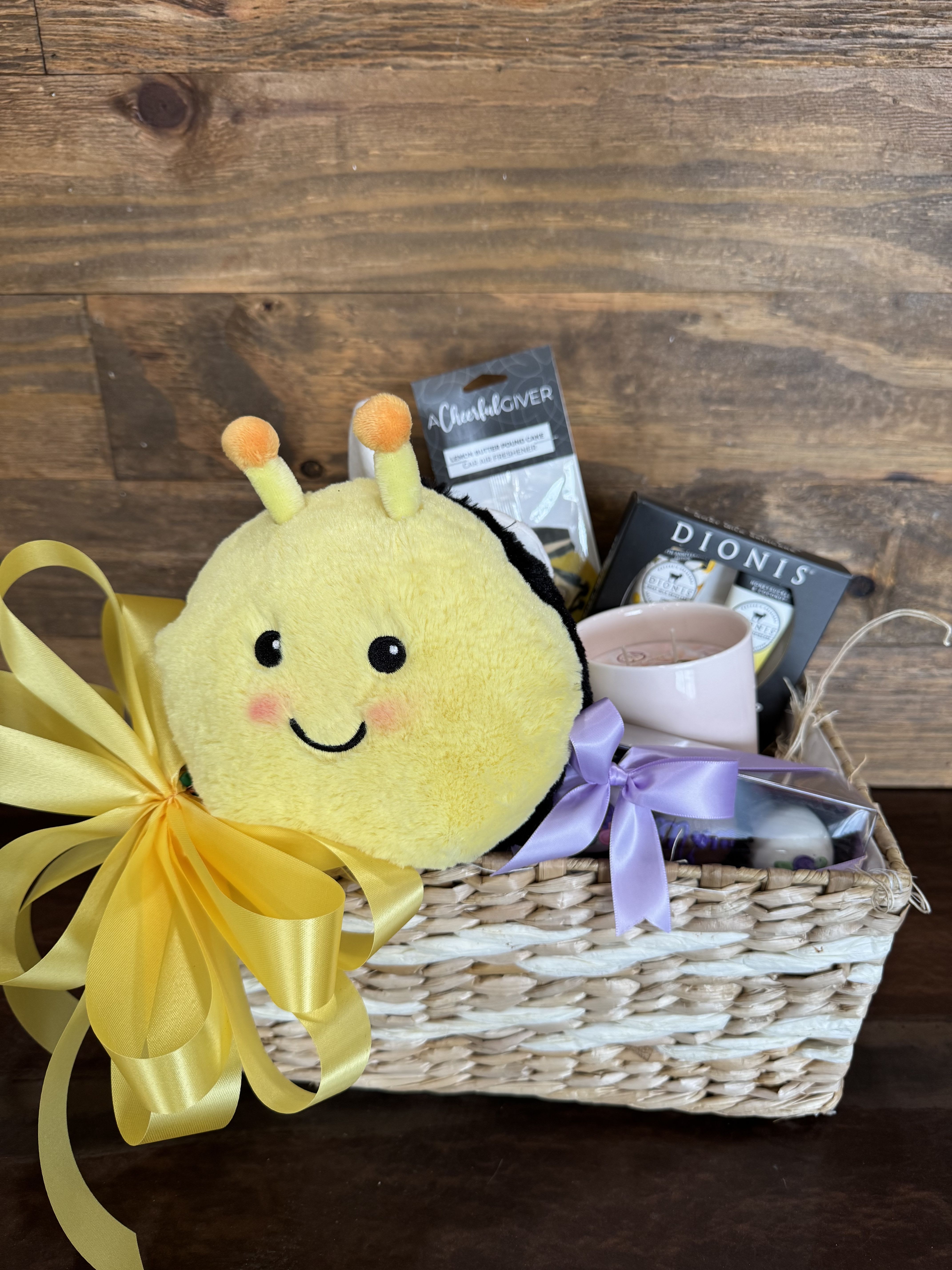 Perfect Gift Basket - Fun gift basket filled with a beautiful candle, hand lotion, Warmie, care freshener, basket and truffles. 