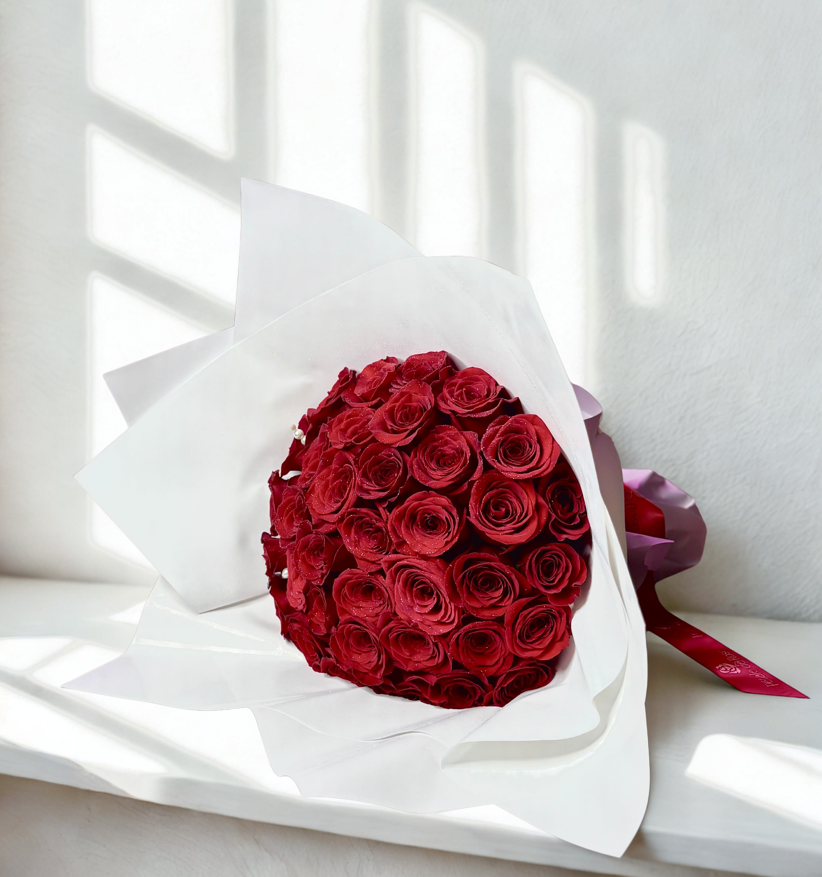 36 roses Bouquet  - Enjoy 36 roses with white wrapping paper . Elegance and luxury 