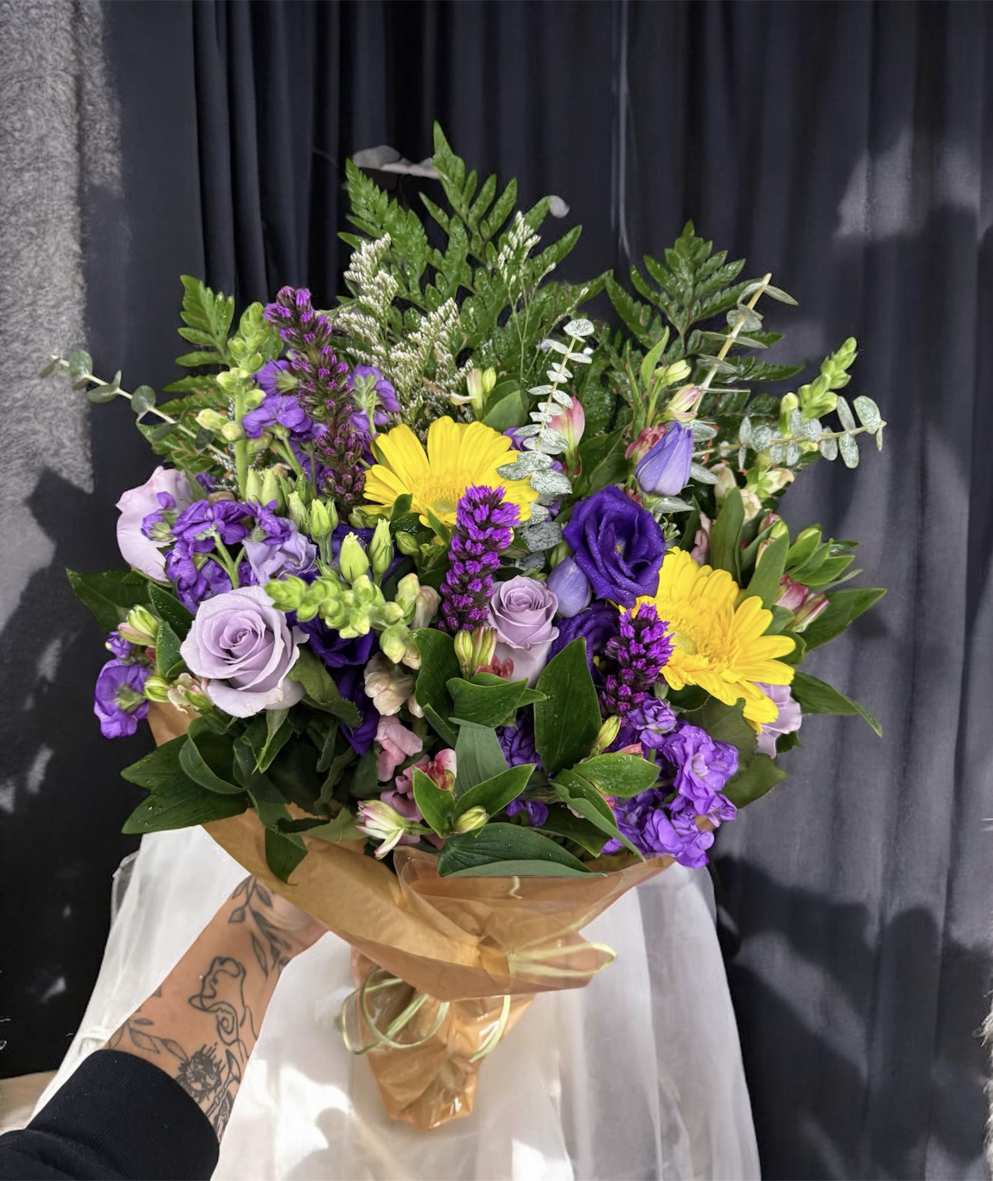 Designer's Choice Wrapped Bouquet - This one-of-a-kind flower bouquet is a made-to-order piece which is unique and exclusive for every order. The best thing about choosing a Designer’s choice bouquet is that it allows you to get the best value for your money. Our expert designers also make sure that your customized flower bouquet is made in a way that reflects its purpose, and expresses the right kind of message that you want to share.   The Designer’s Choice Wrapped Bouquet comes without a vase.