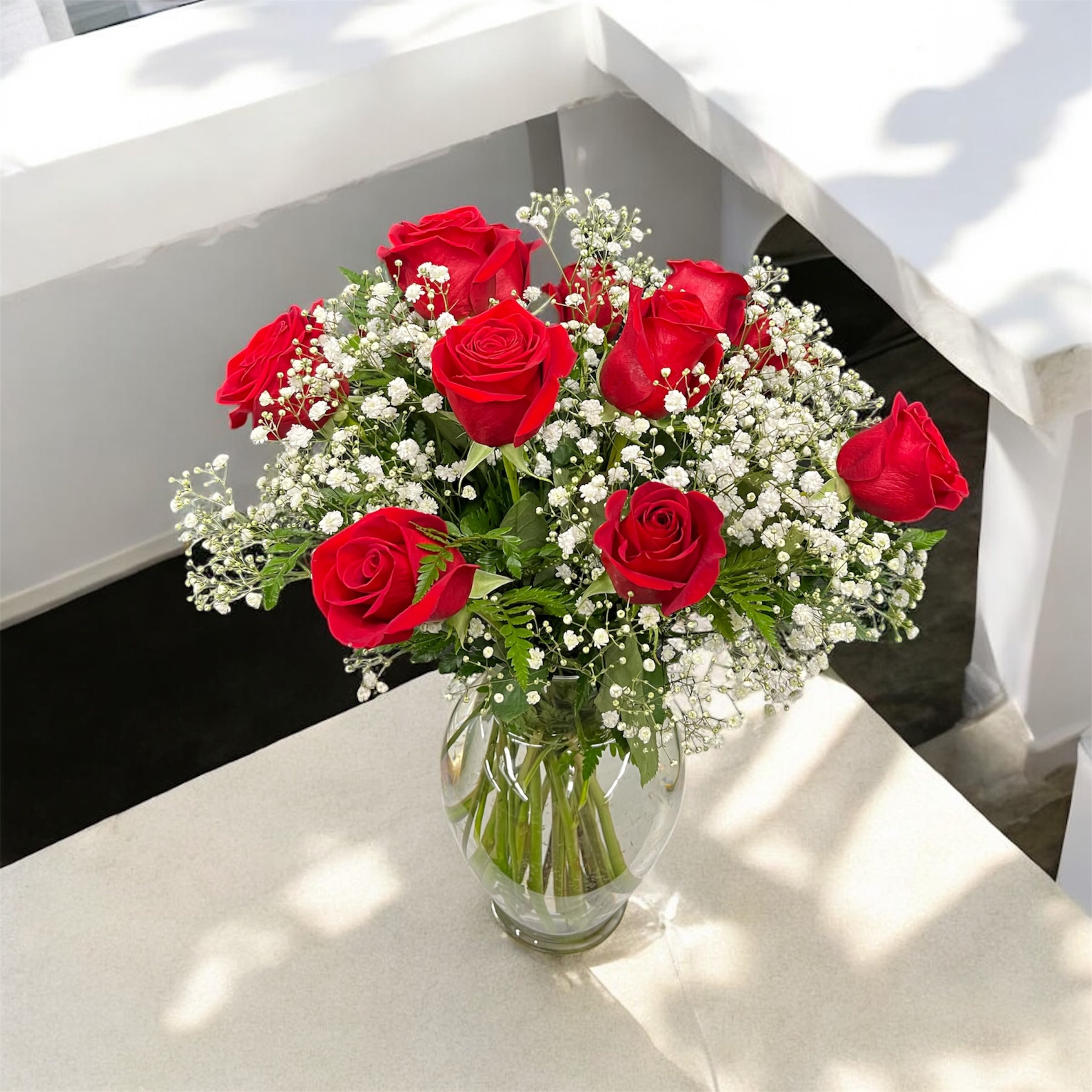 Classic Red Rose Arrangement - Allow our expert florists to create a gorgeous rose arrangement, using the freshest and most beautiful roses available. This is the best value you'll find! The designer's choice of fresh roses will be arranged and ready to enjoy.