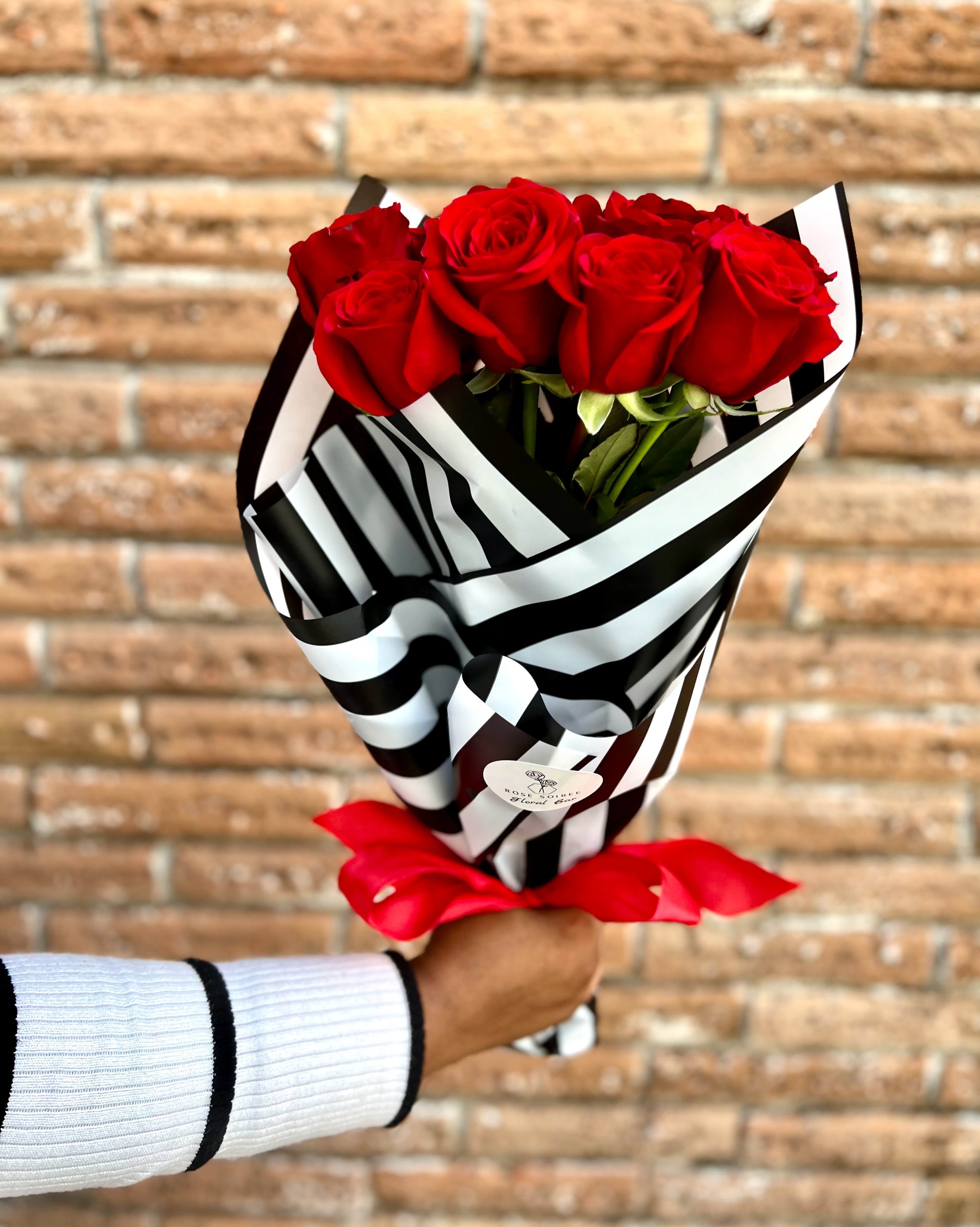 Roses are Red Presentation bouquet - Classic Red Roses with a Rose Soiree touch of opulent black and white florists paper.