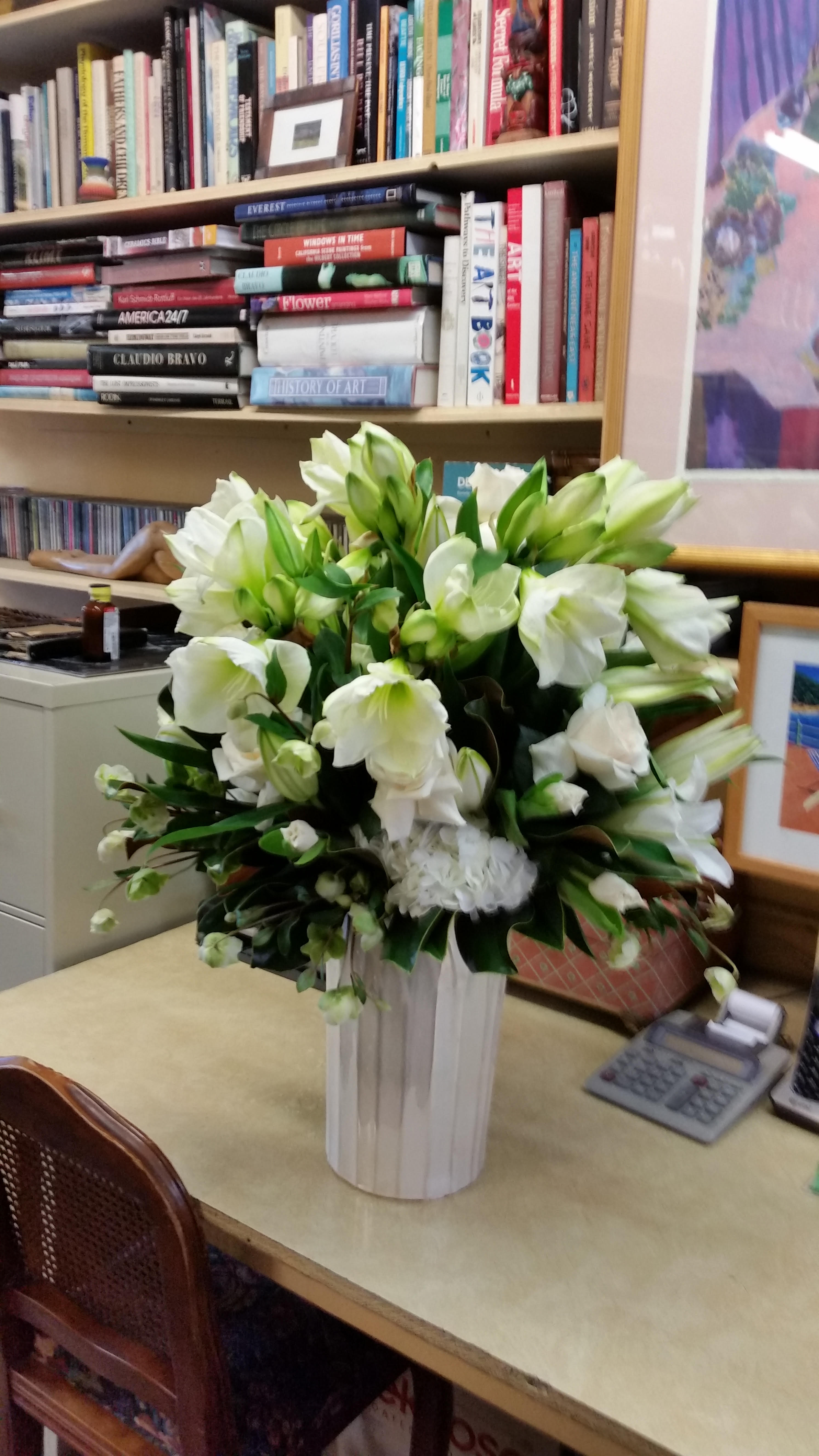 holiday present - white tulip, white rose white amarylis and x-mas greener