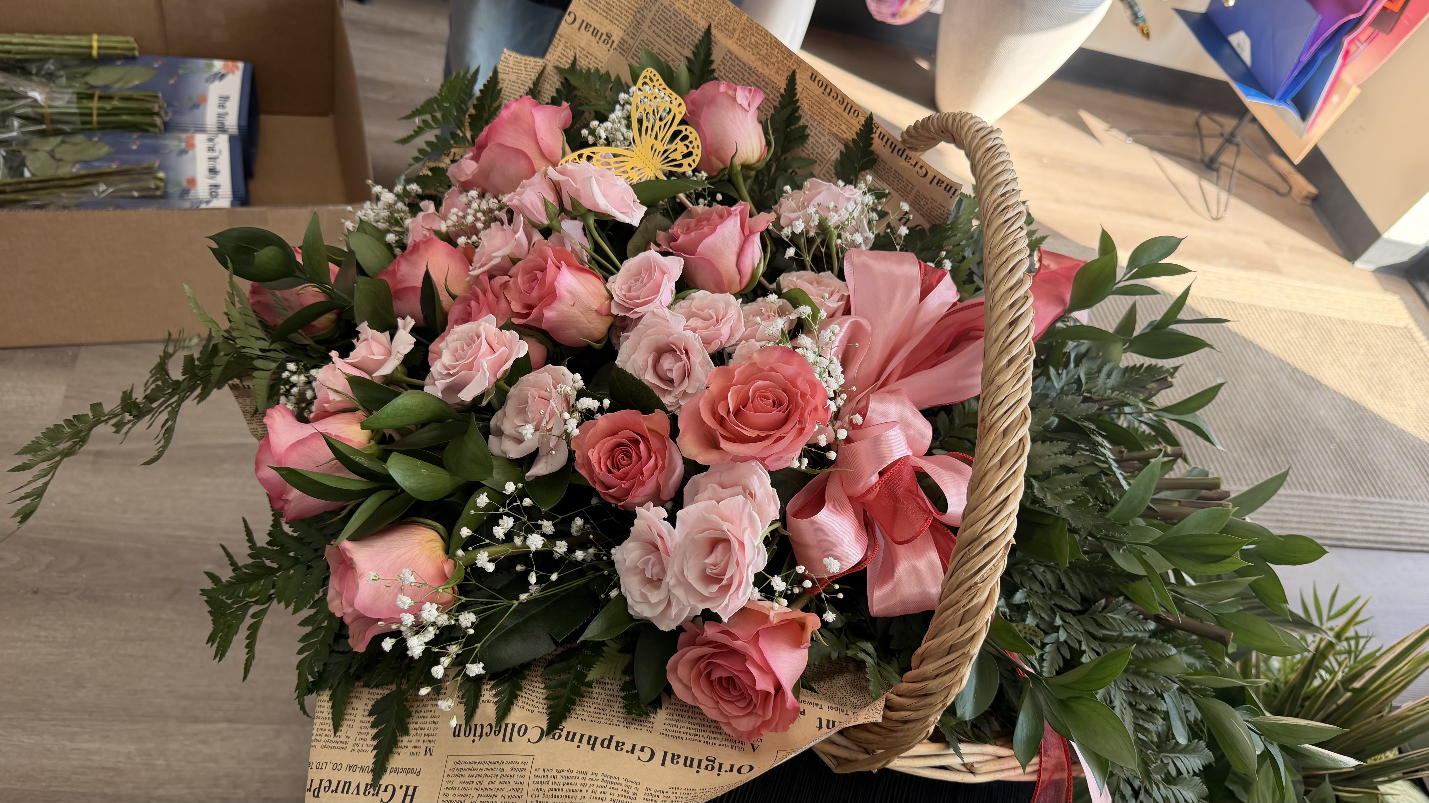 Parisian Basket - Available in additional colors or with added flowers upon request. Each arrangement is handcrafted; flower varieties may vary slightly based on seasonal availability.