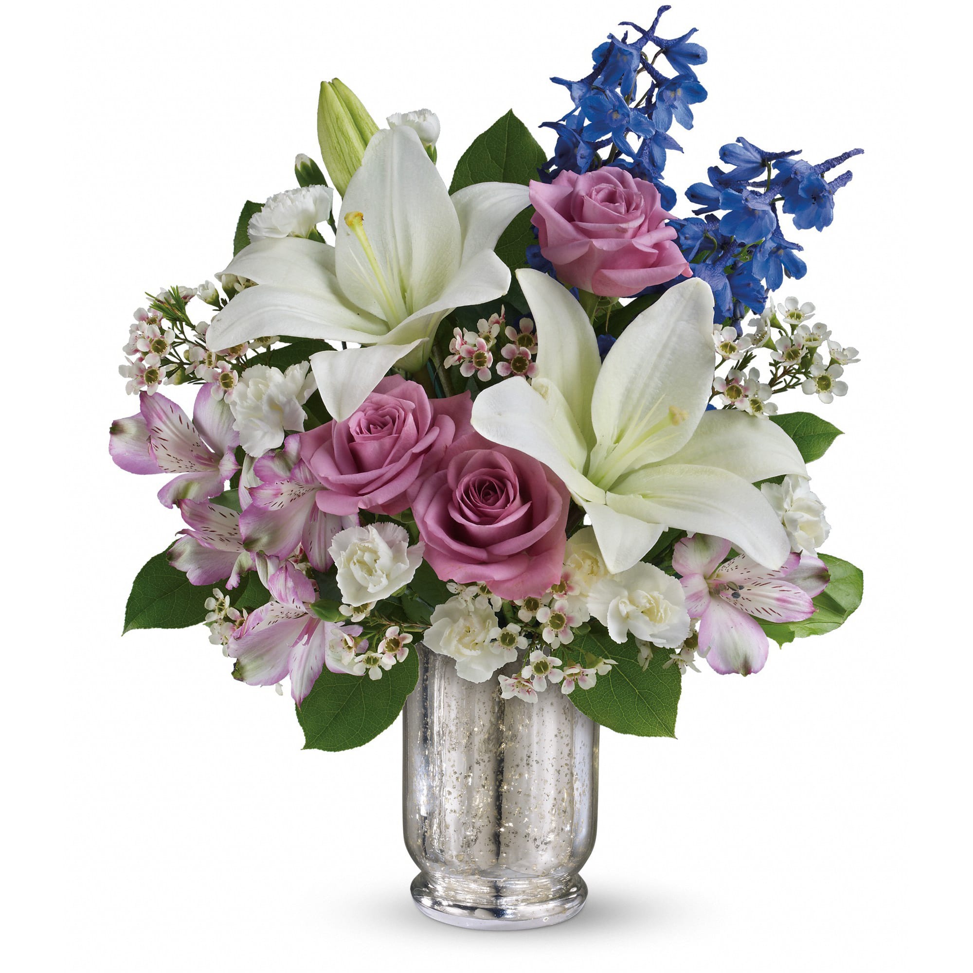 Garden Of Dreams Bouquet - Make her dreams come true with this ethereal bouquet, presented in a stunning Mercury Glass hurricane. Beautiful snow-white lilies, lavender roses and a bright blue hint of delphinium create a dreamy declaration of your affection she'll never forget.  Orientation: One-Sided 