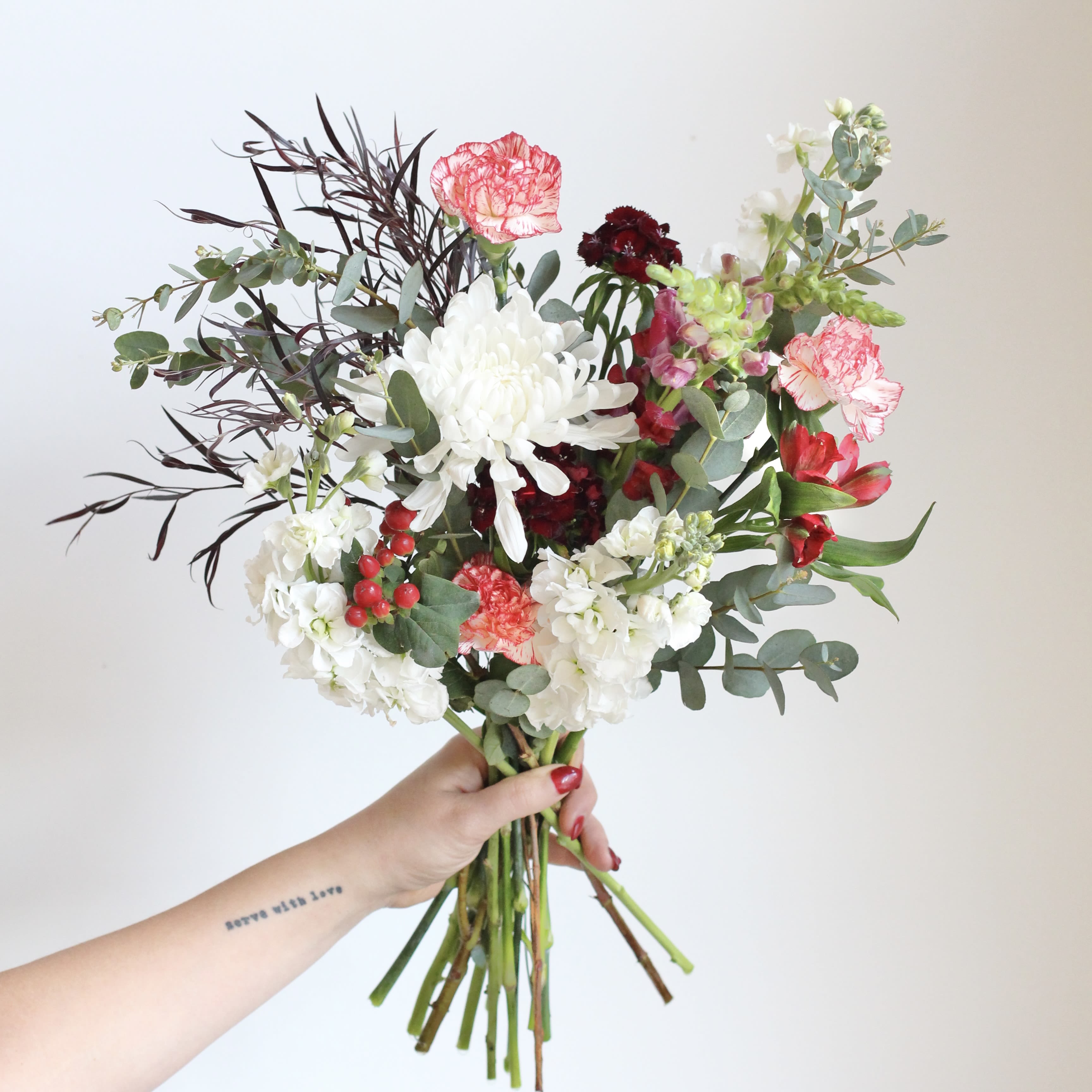 Designer's Choice Bouquet -Everyday - Designer's Choice Everyday Bouquet, Grab n Go. In Studio only. These small bouquets are thoughtfully arranged with fresh, seasonal blooms chosen by our designers. Perfect for a quick gift or a little something just because. Pricing includes a wet wrap, paper wrap, and ribbon.