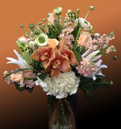 Bronze Cymbidium Dream - bronze cymbidium coupled with white hydrangea and lilies, peach stock makes this arrangement not only beautiful but fragrant 