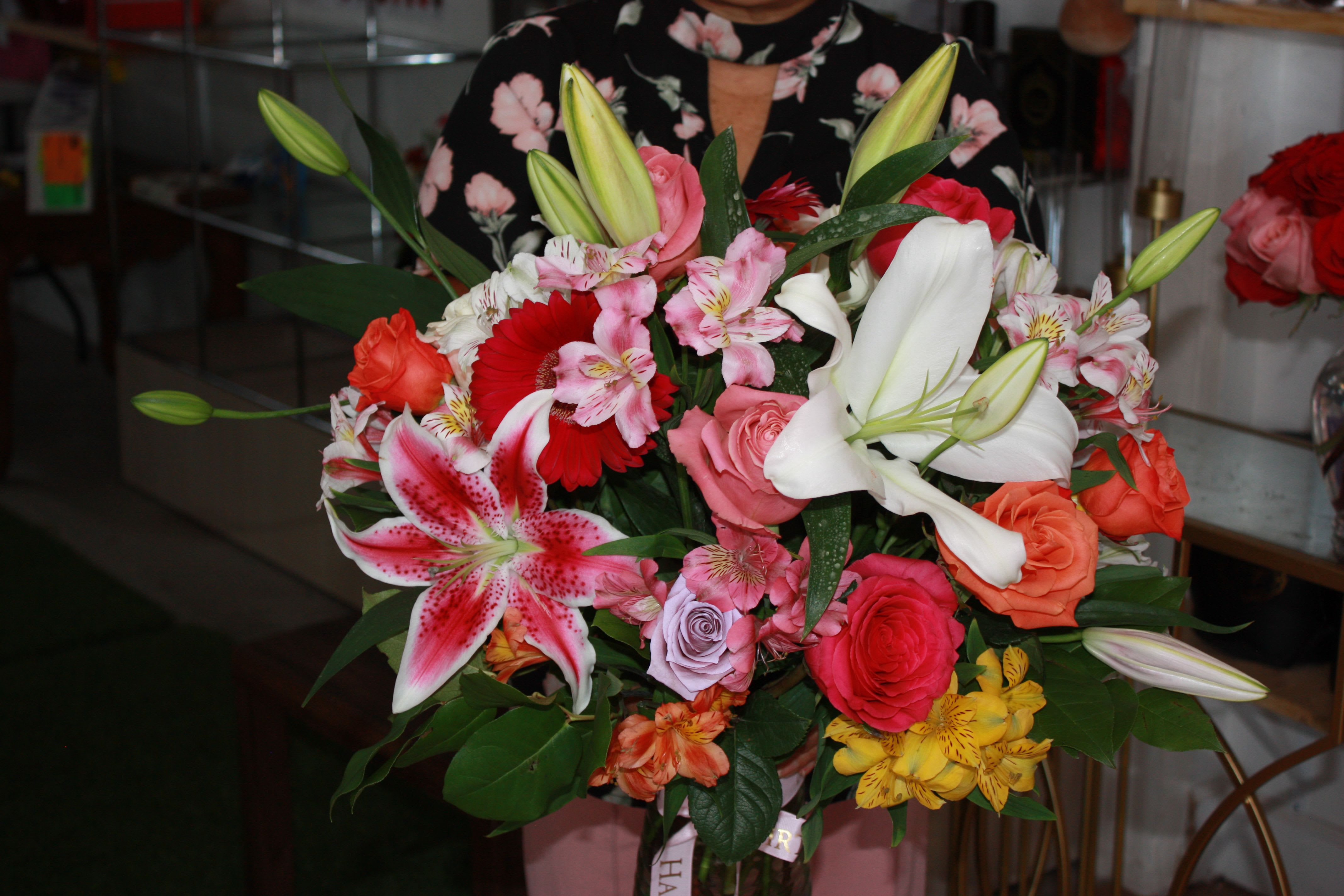 Designer Free Style - a mix of lilies gerbers and alstro light greens