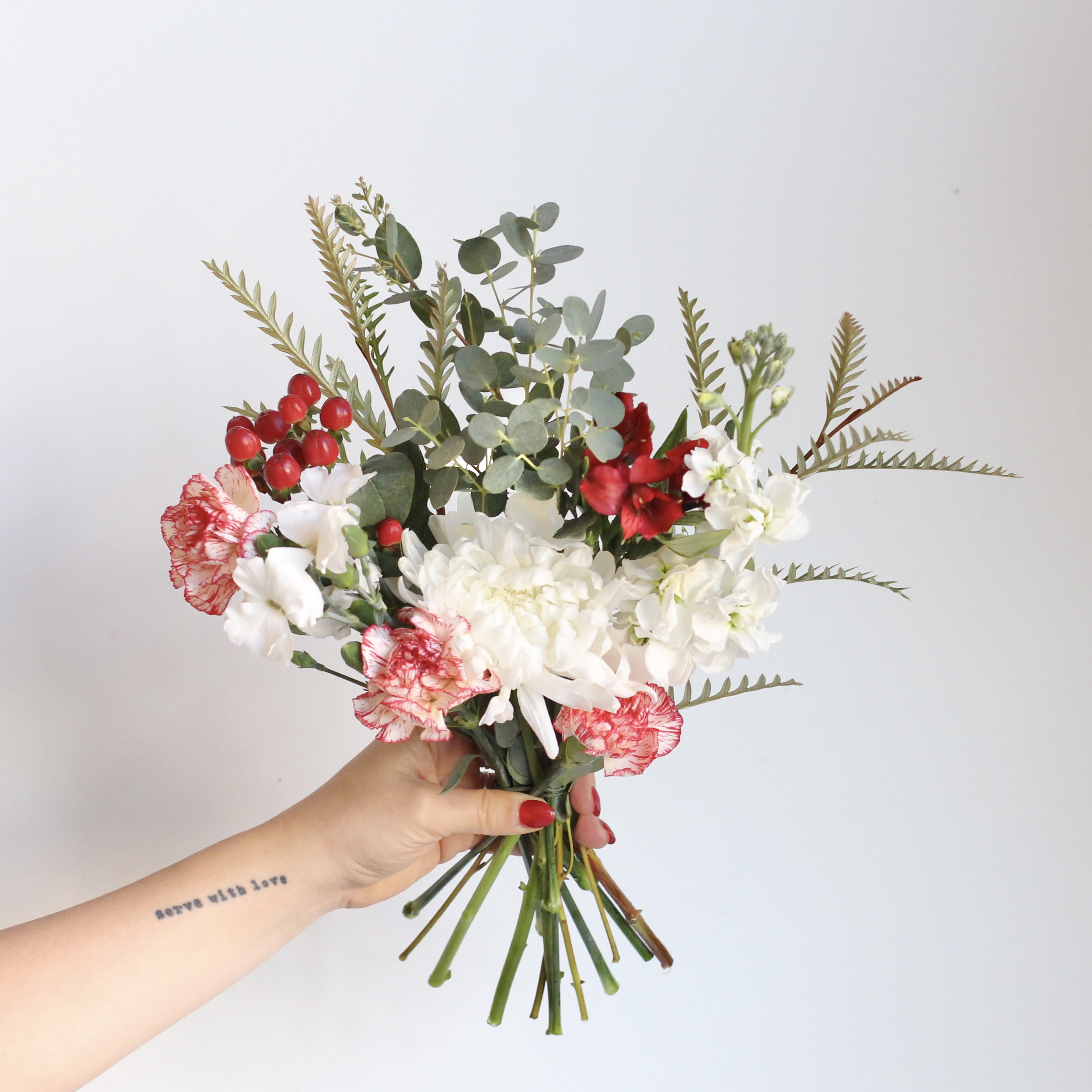 Designer's Choice Bouquet -Mini - Designer's Choice Mini Bouquet, Grab n Go. In Studio only. These mini bouquets are thoughtfully arranged with fresh, seasonal blooms chosen by our designers. Perfect for a quick gift or a little something just because. Pricing includes a wet wrap, paper wrap, and ribbon.