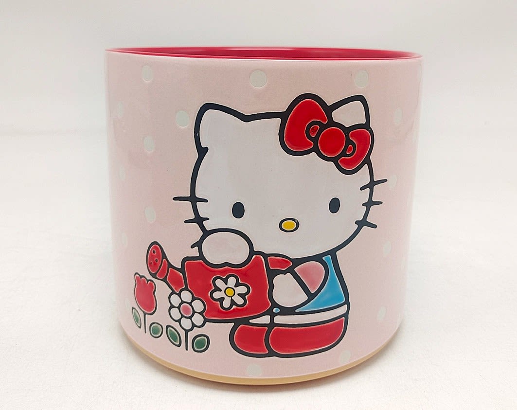 Hello Kitty Garden 6.5“ Planter  - Hello Kitty Garden 6.5“ Planter,Meet the adorable Hello Kitty, a product of Blue Sky Clayworks, known for our unique, handcrafted, and hand-painted ceramics. This decorative figurine is a perfect addition to your home accents, bringing a touch of fun and whimsy to any space. It's an ideal choice for collectors who appreciate high-quality design and craftsmanship. 