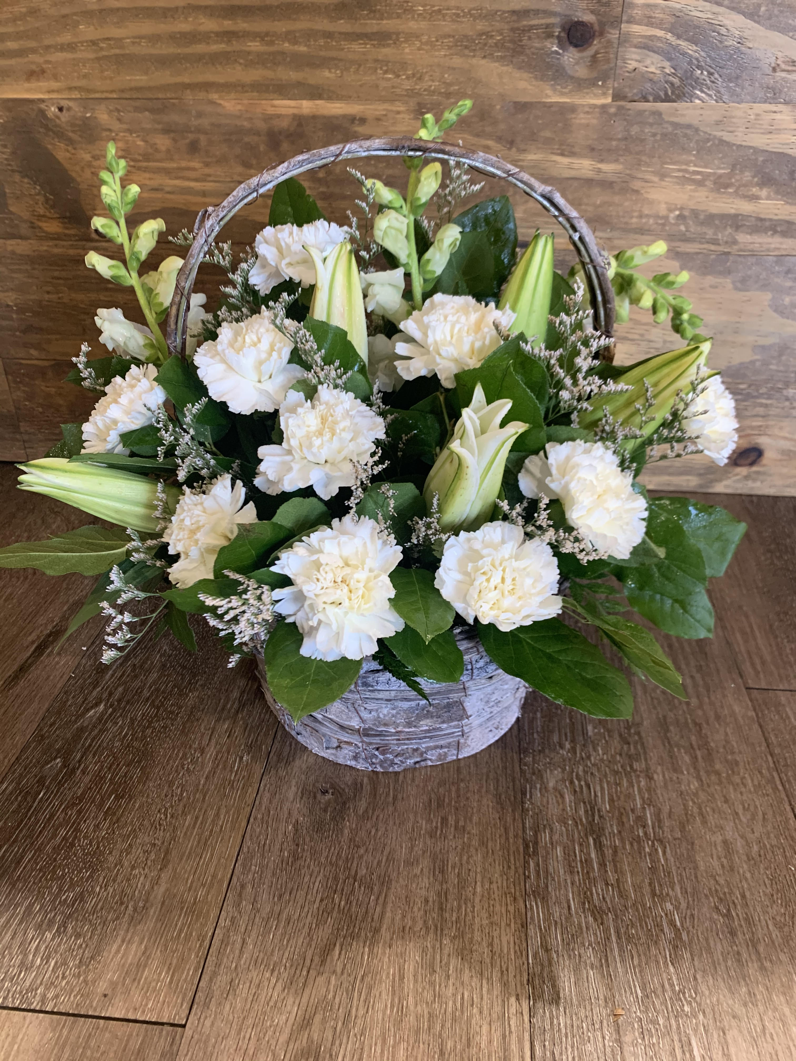 Wonderful in White  - Elegant basket arrangement of white carnations, lilies and more. 