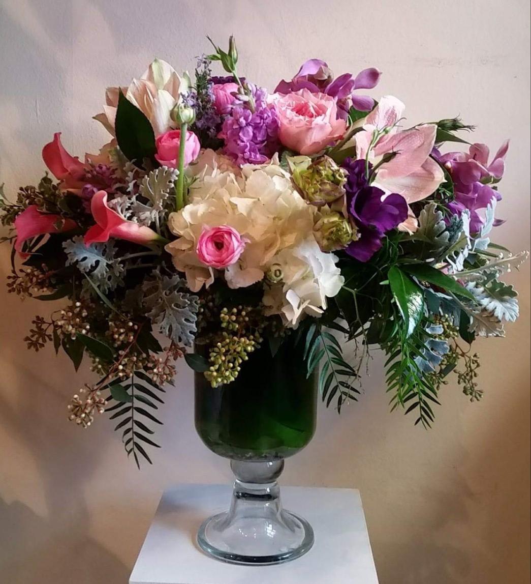 La Amatista - Lovely, tall and elegant arrangement in feminine colors.