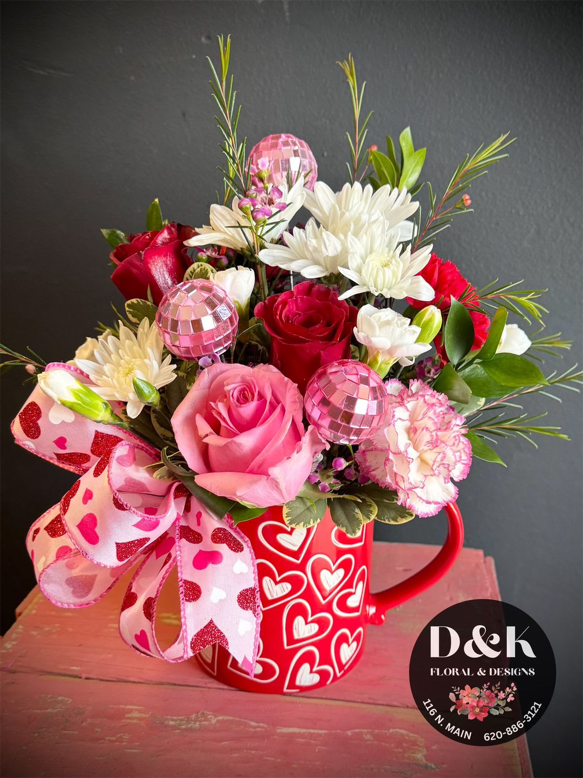 Valentine's Day Coffee Mug Bouquet - Valentine's day coffee mug filled with assorted florist choice of flowers. 