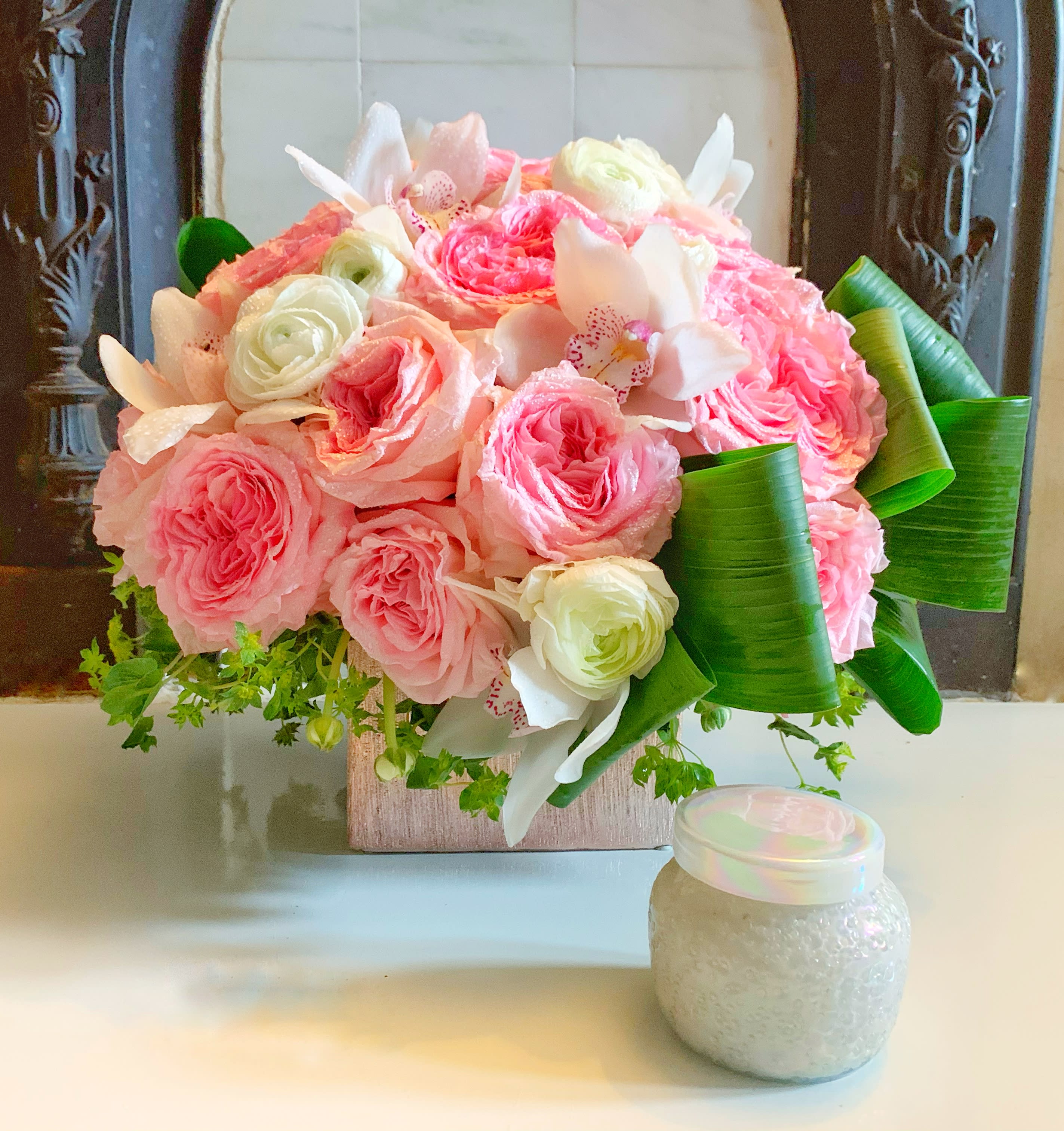The Fallon - Timeless and Beautiful, this large arrangement whispers luxury and the garden rose scent is delicious. Pinks, whites and creams come together to create an appealingly feminine gift. Perfect for an anniversary, wishing happy birthday or simply saying I love you.  This gorgeous arrangement was inspired by one of our first time buyers' love note. In his honor, we name it, "The Fallon."  APPROXIMATE DIMENSIONS: 18" W X 17" H